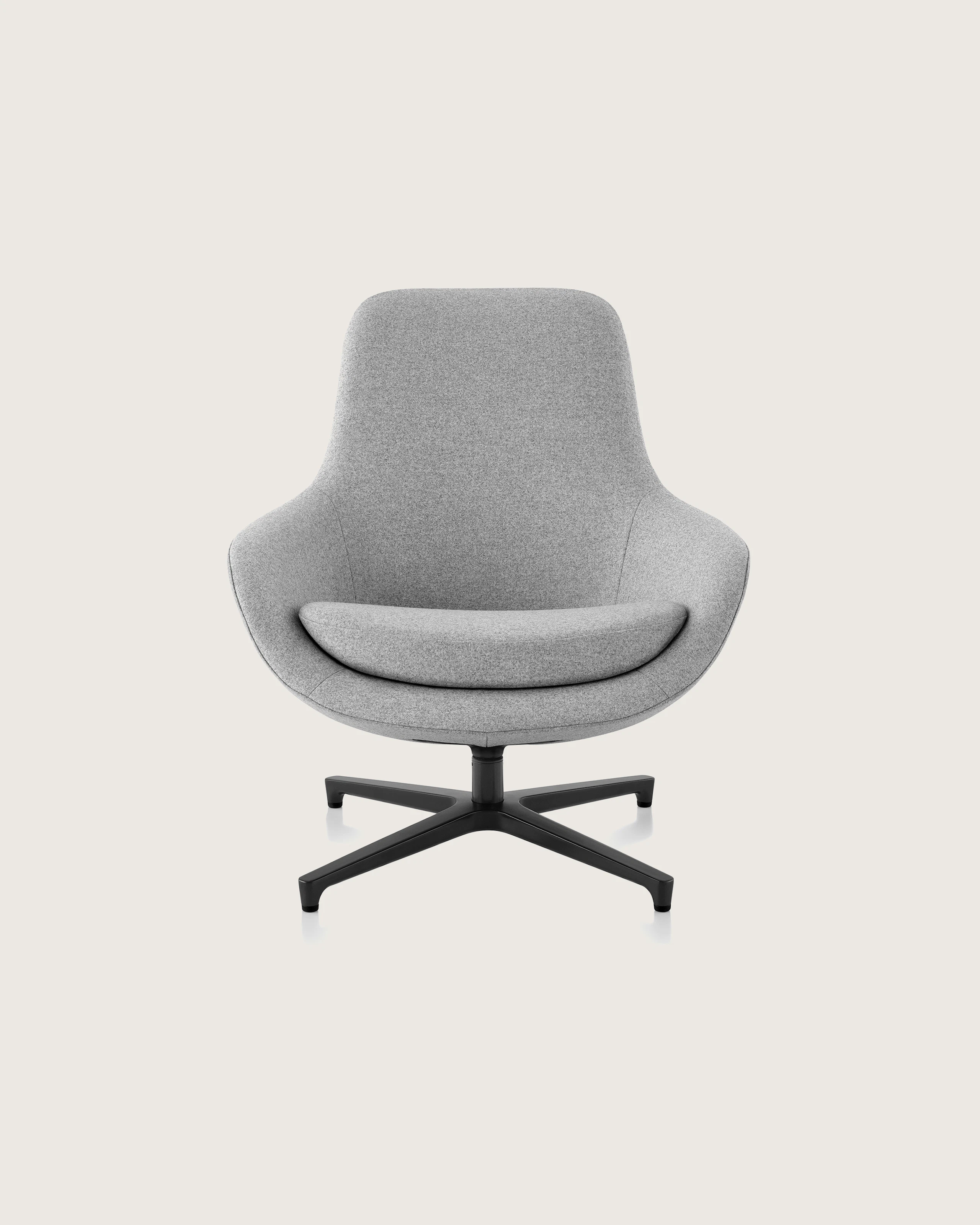 Saiba Lounge Chair in a light grey textile with a black four-star swivel base.