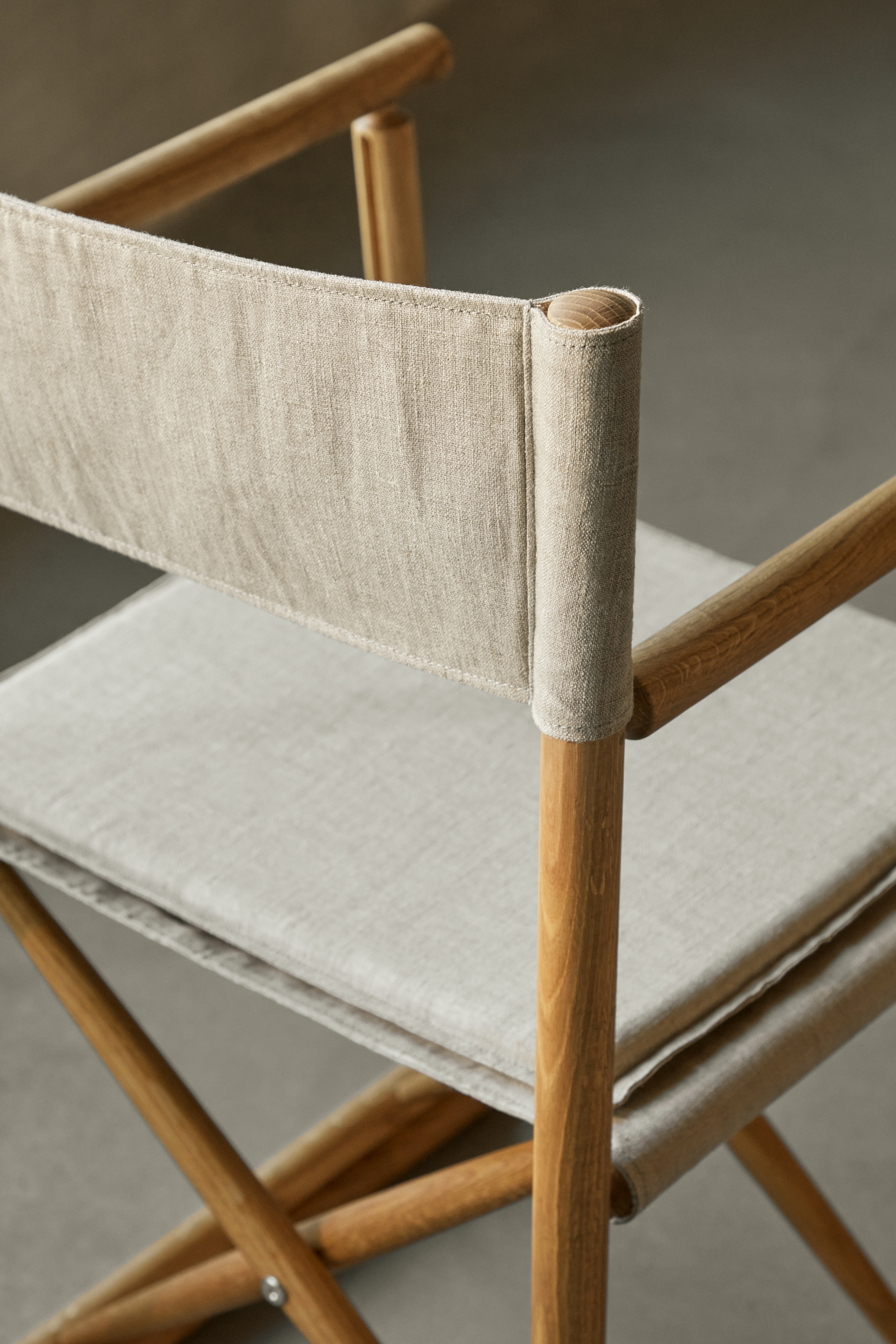 A detailed look at a J138 Folding Chair in Oiled Oak.