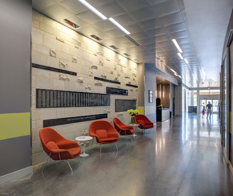 healthcare lounge Eero Saarinen Womb Chair Saarinen Pedestal Table outpatient facility hallway