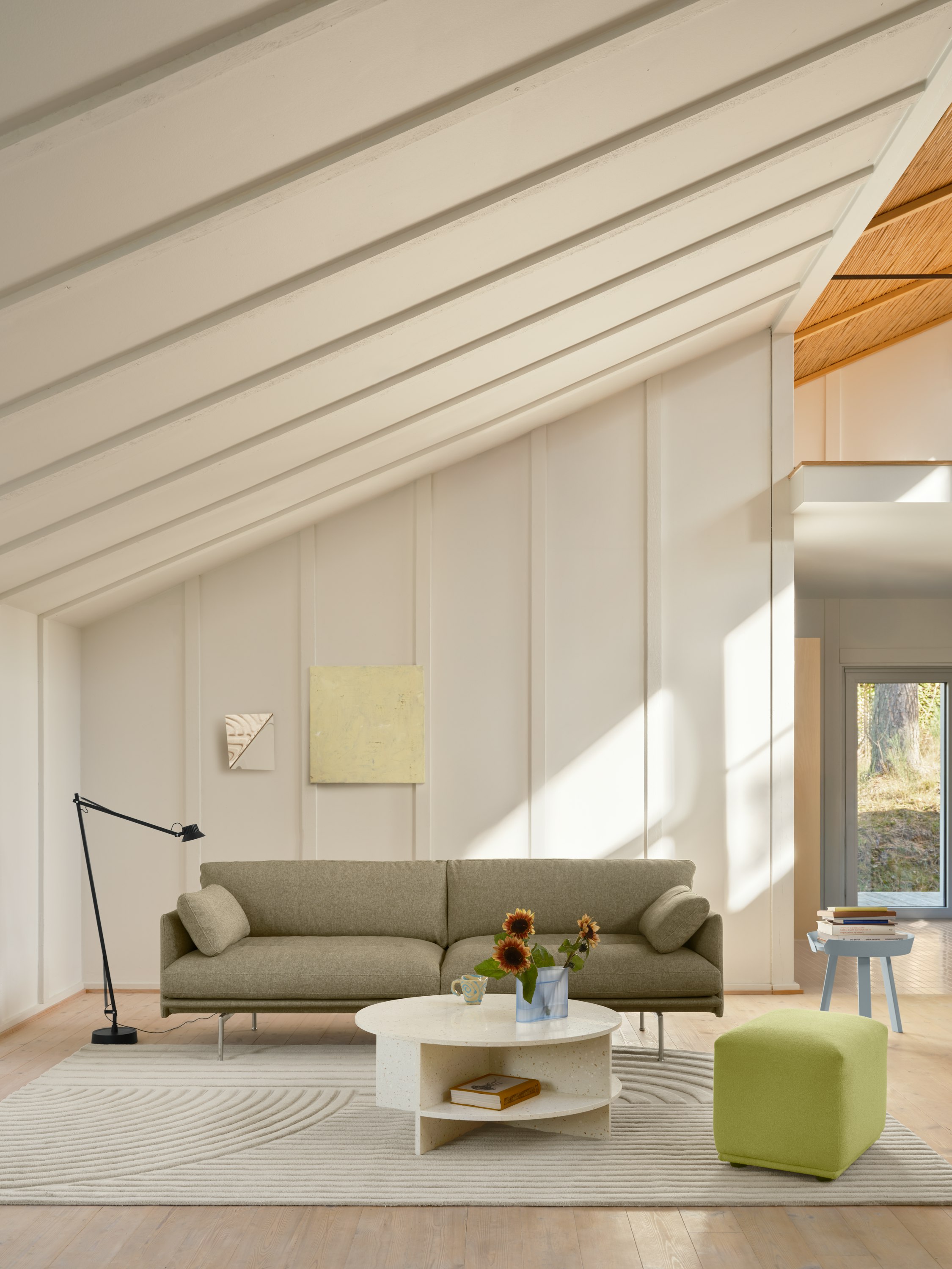 Outline Soft 3-seater in Clay 15 Aluminum Base - Echo Pouf in Acca 961 - Relevo Rug in Off-White - Halves Coffee Table in Light Taupe - Around Coffee Table in Light Blue - Ridge Vase H16 in Light Blue - Dedicate Floor Lamp in Black