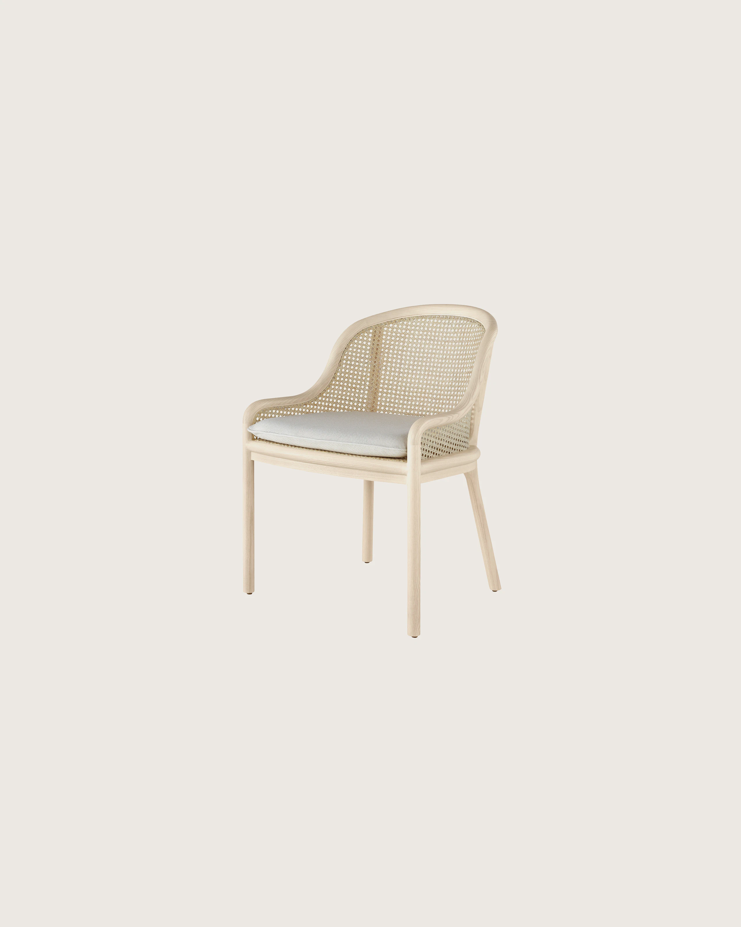 Landmark Chair with a cane back and a seat upholstered in a Double Beam textile, viewed at an angle.