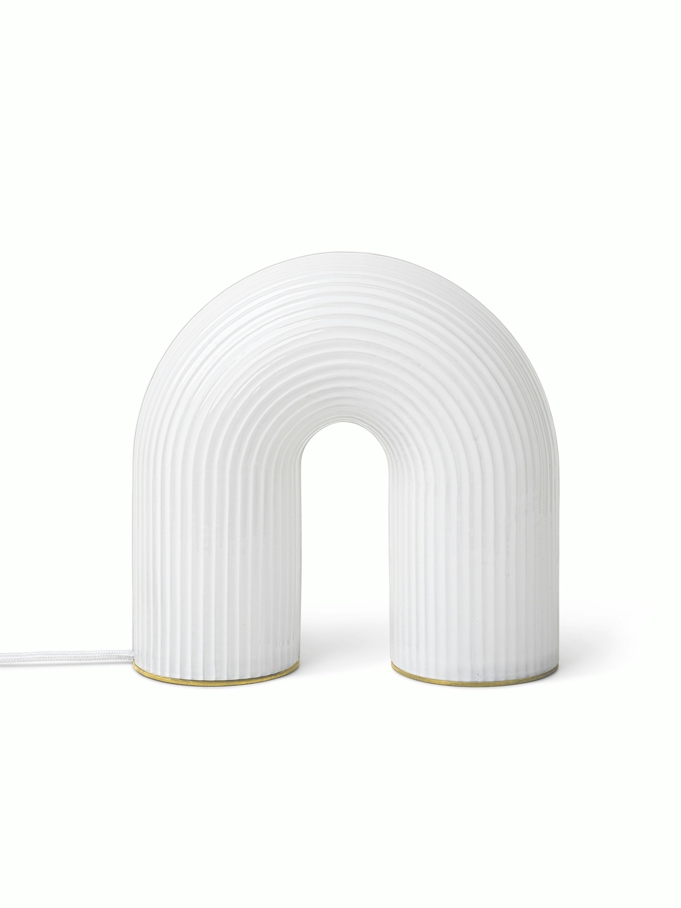 A Vuelta Table Lamp in white Viewed from the front.