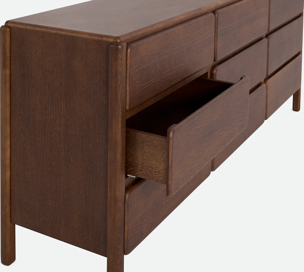 Dark wood dresser drawers open