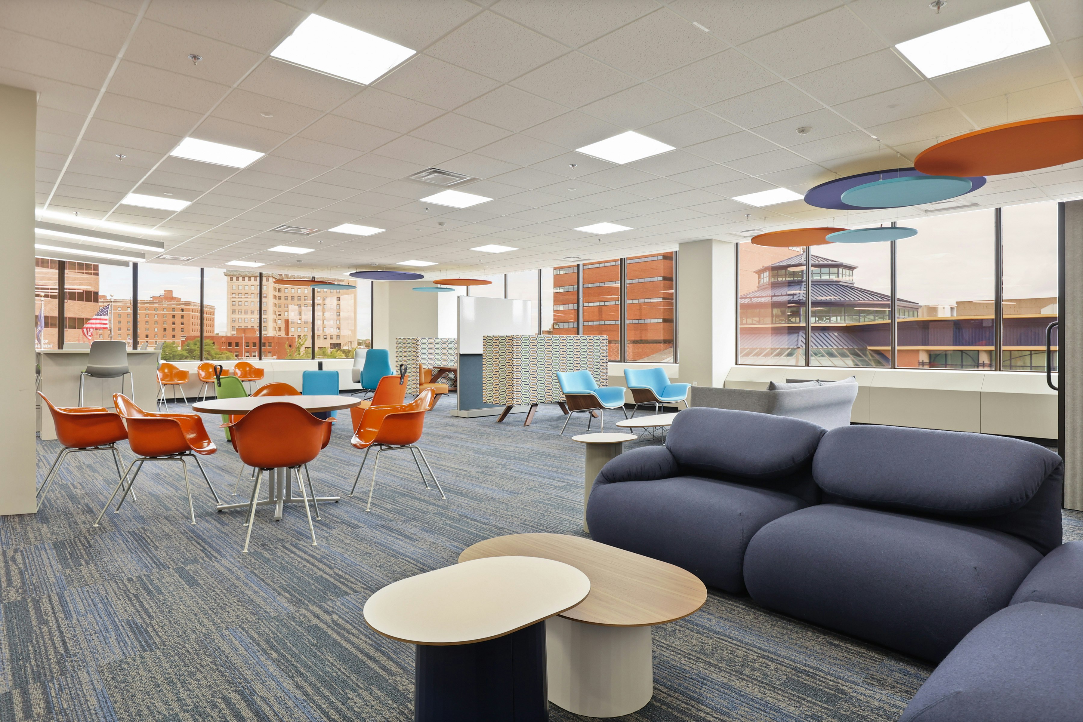 Large communal seating area furnished with pieces from the MillerKnoll Collective of brands at the Genesse County administration building in Michigan.