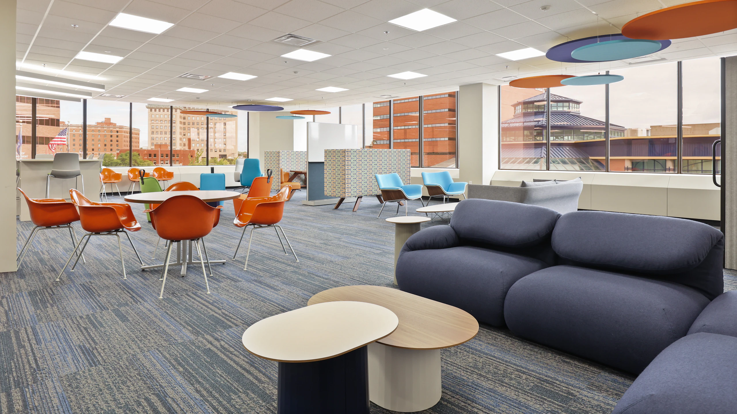 Large communal seating area furnished with pieces from the MillerKnoll Collective of brands at the Genesse County administration building in Michigan.