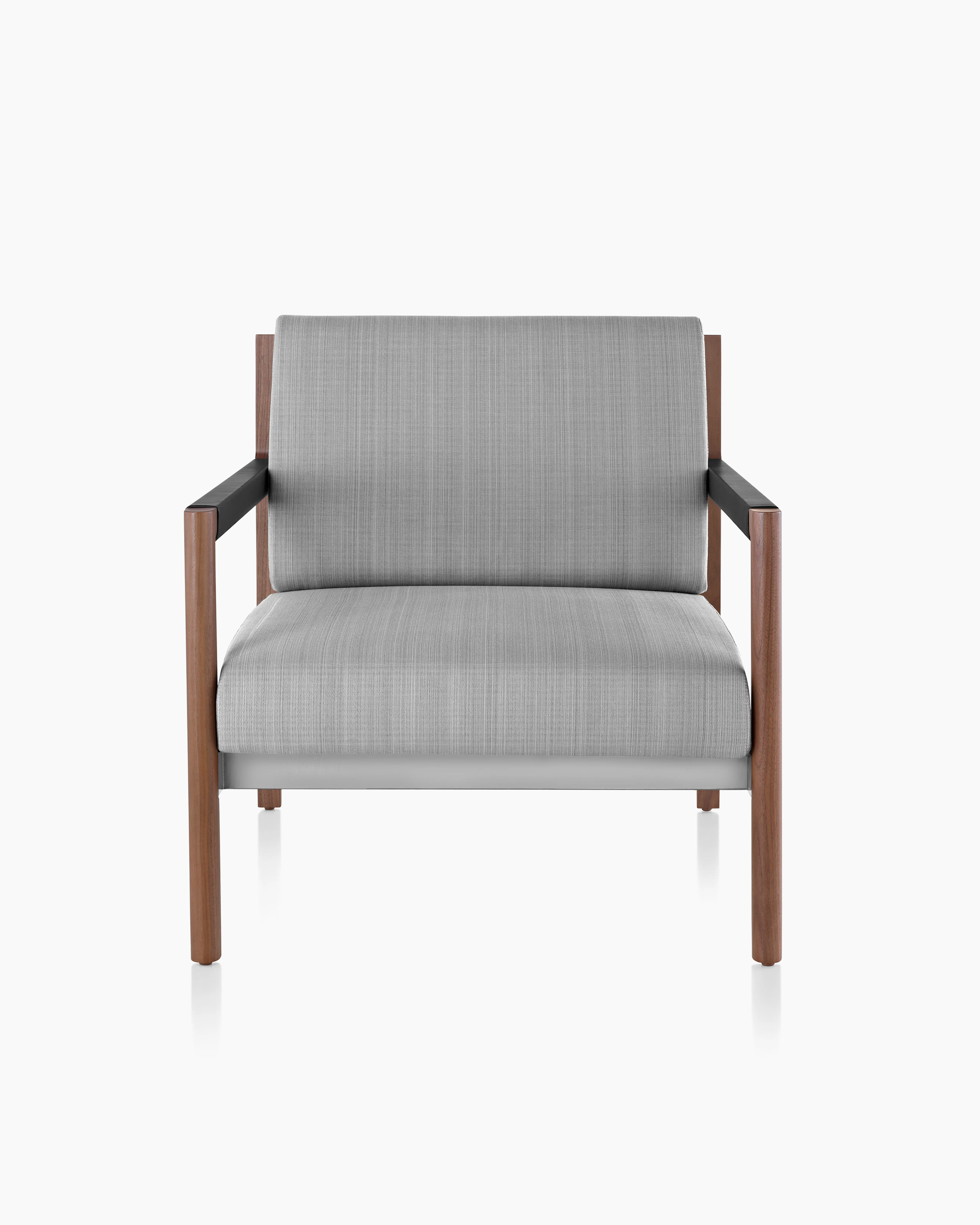 A Brabo Club Chair with light gray upholstery, leather and metal accents, and an exposed wood frame. Viewed from the front.