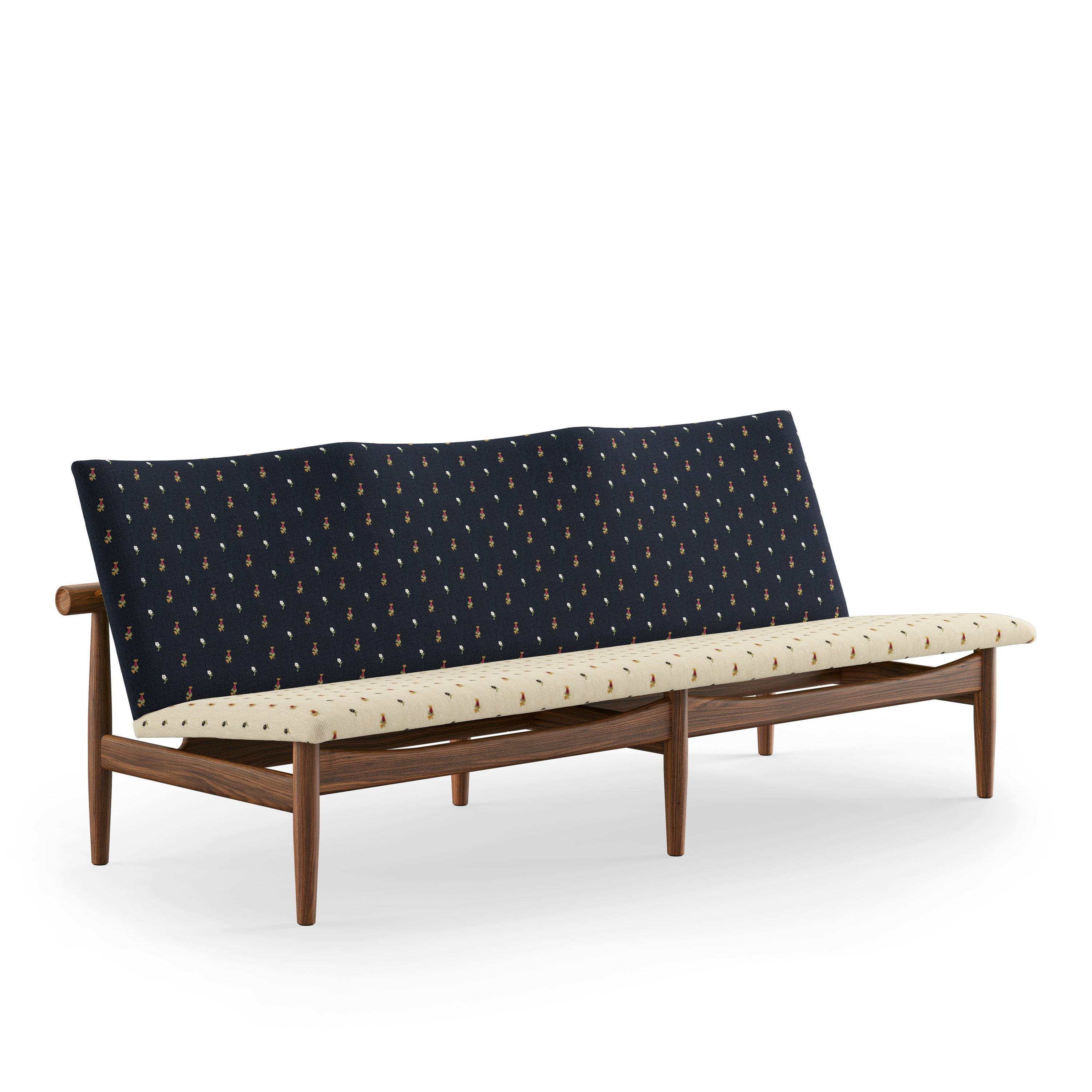 A Japan Sofa in Walnut viewed from an angle.