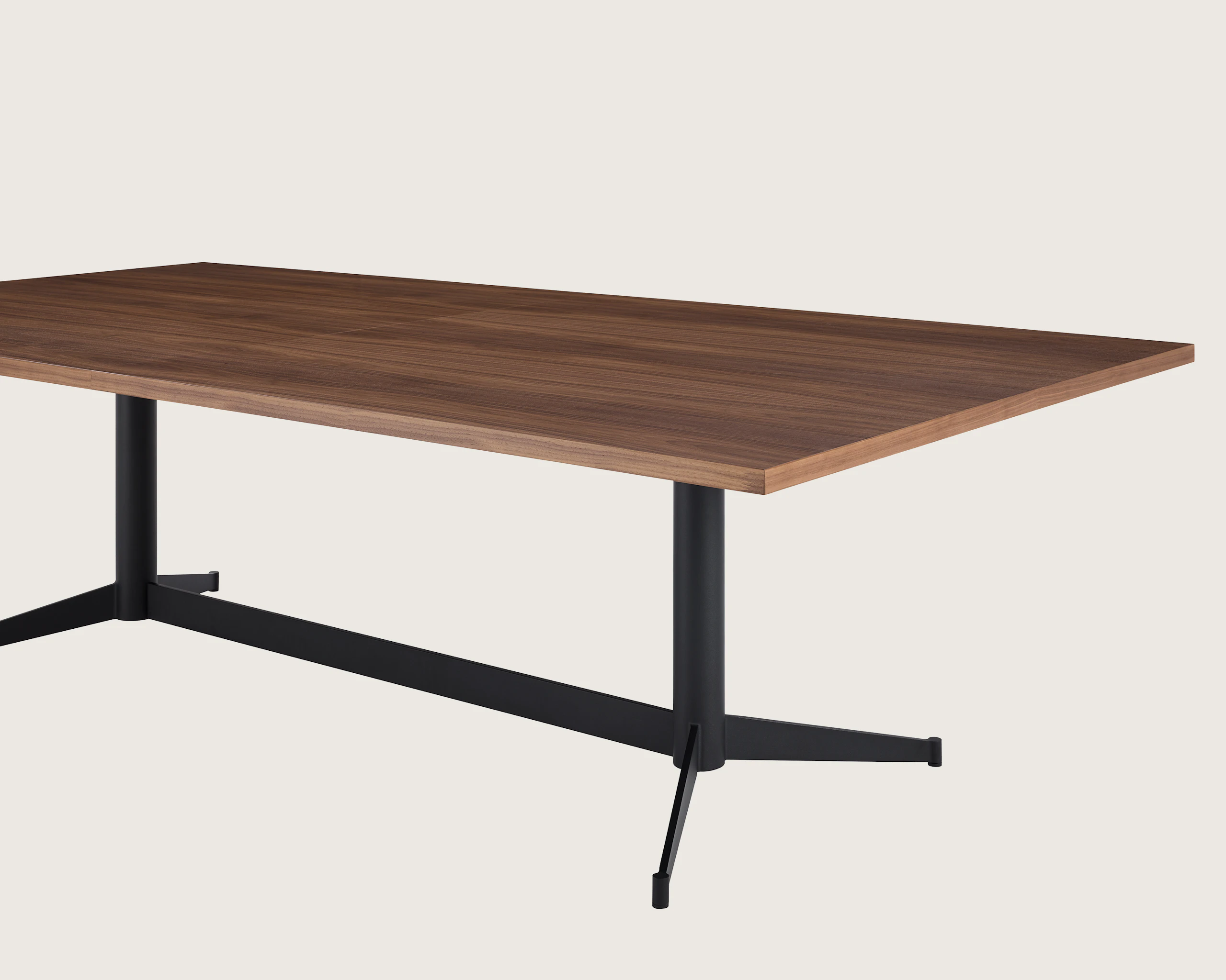 MP Table designed by Amir Paknya for Geiger in Natural Flat Cut Walnut with a Matte Black base shown on a white sweep, angled view of edge.