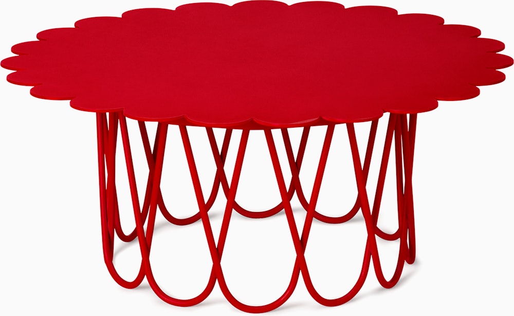 Small red Girard Flower Table on white background.