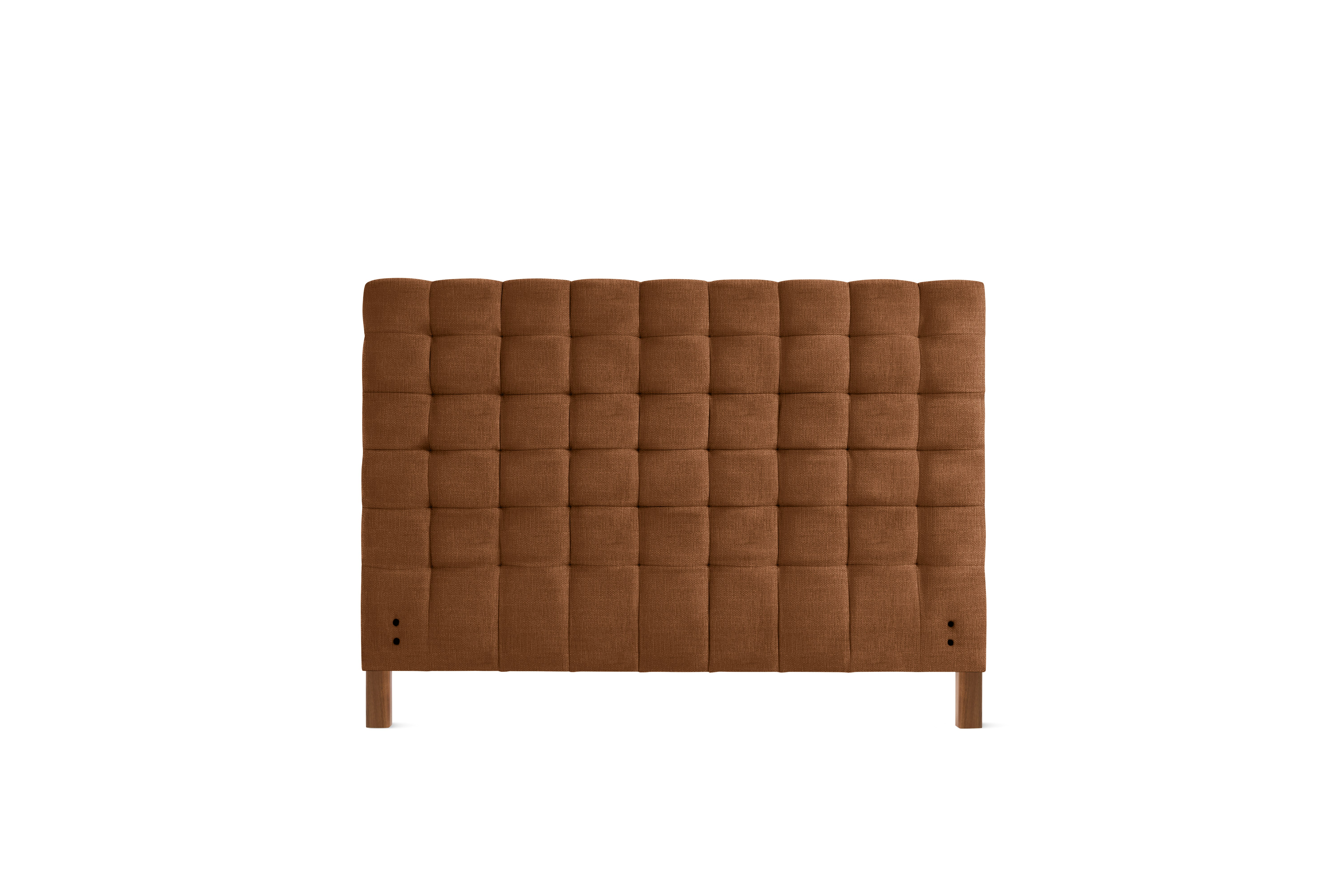 A Madeleine Headboard in Crypton Robusta, Rattan, Walnut viewed from the front.