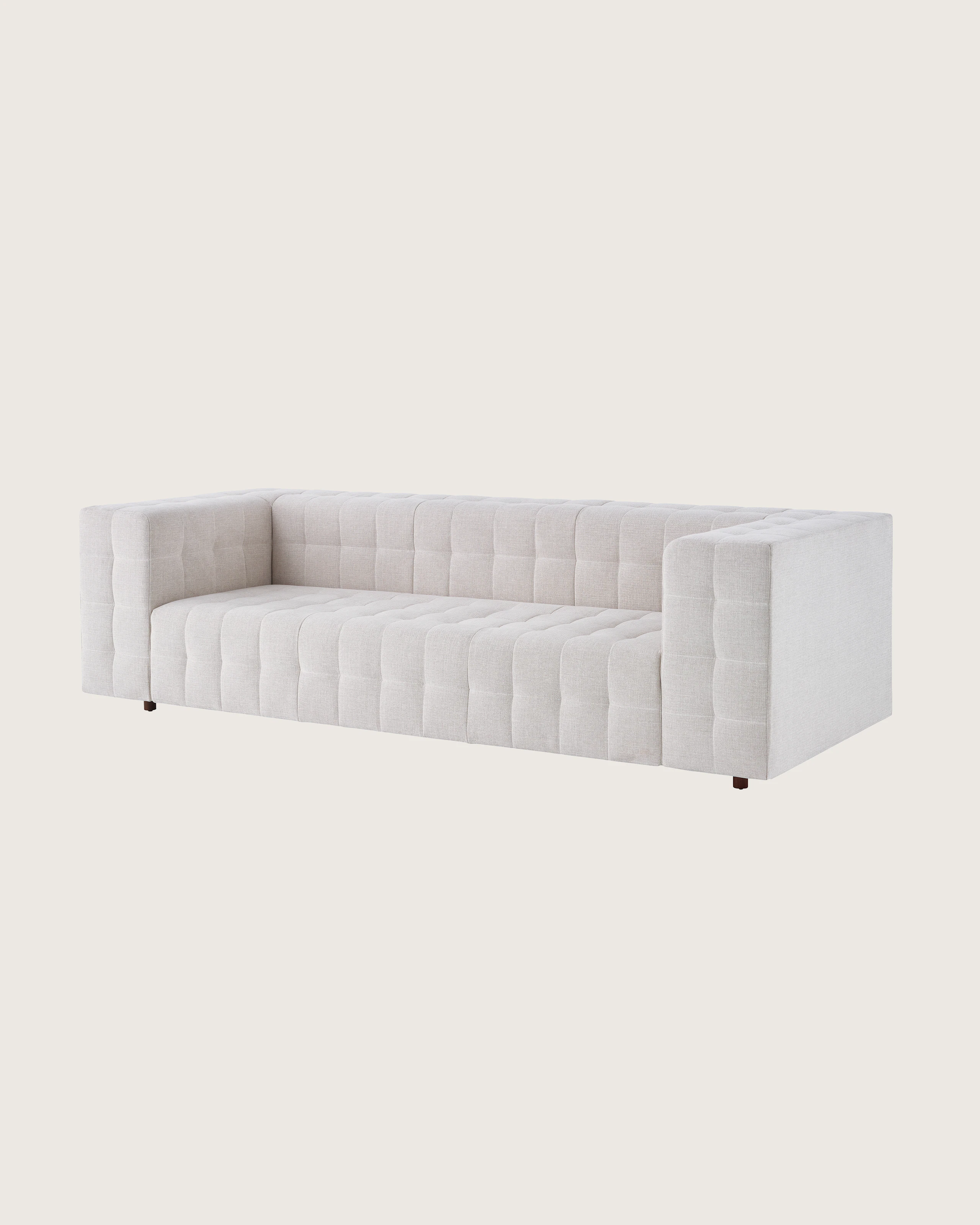 Rapport Sofa with walnut legs.