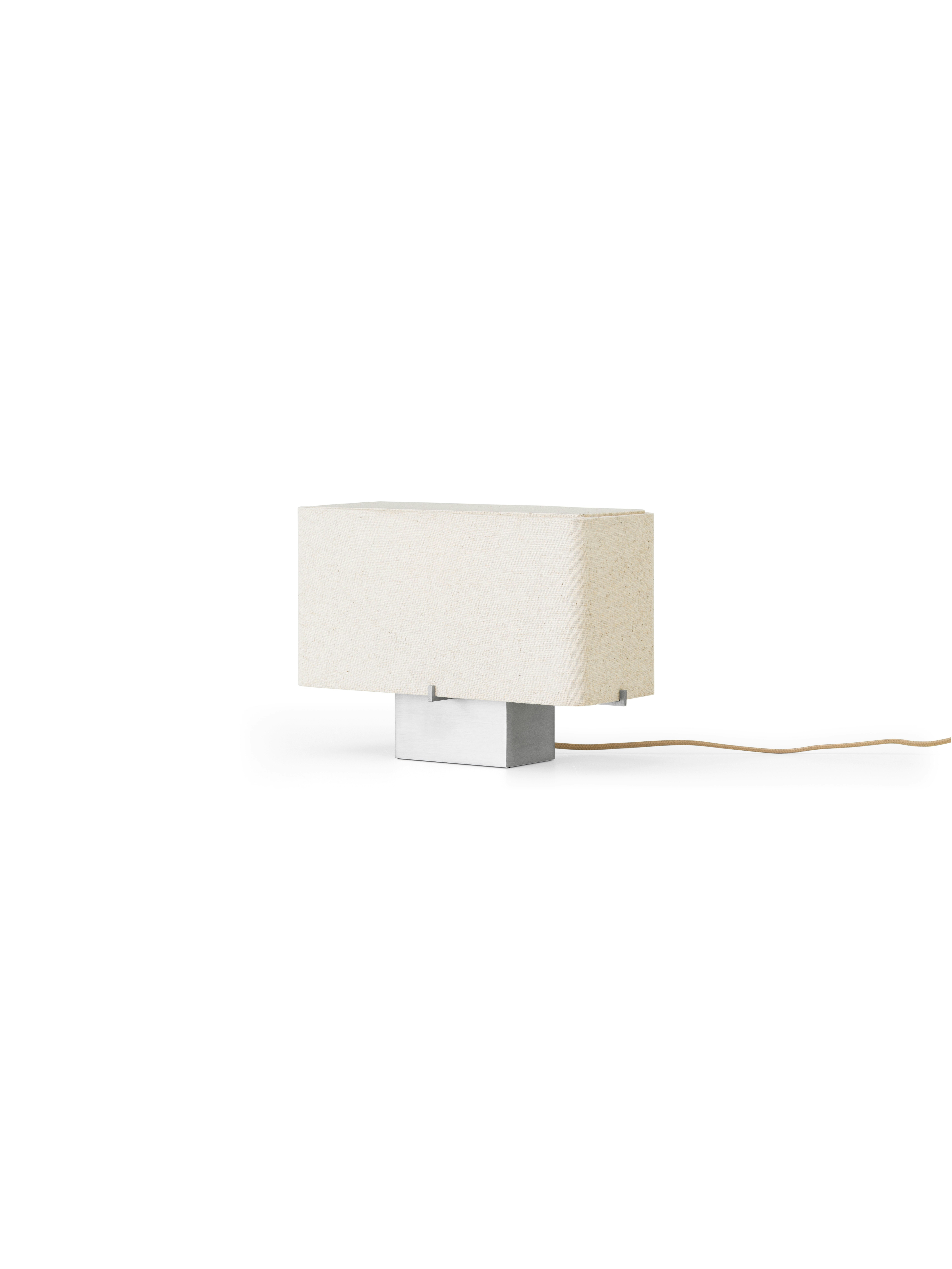 A Nonna Aluminum Table Lamp  viewed from the front.