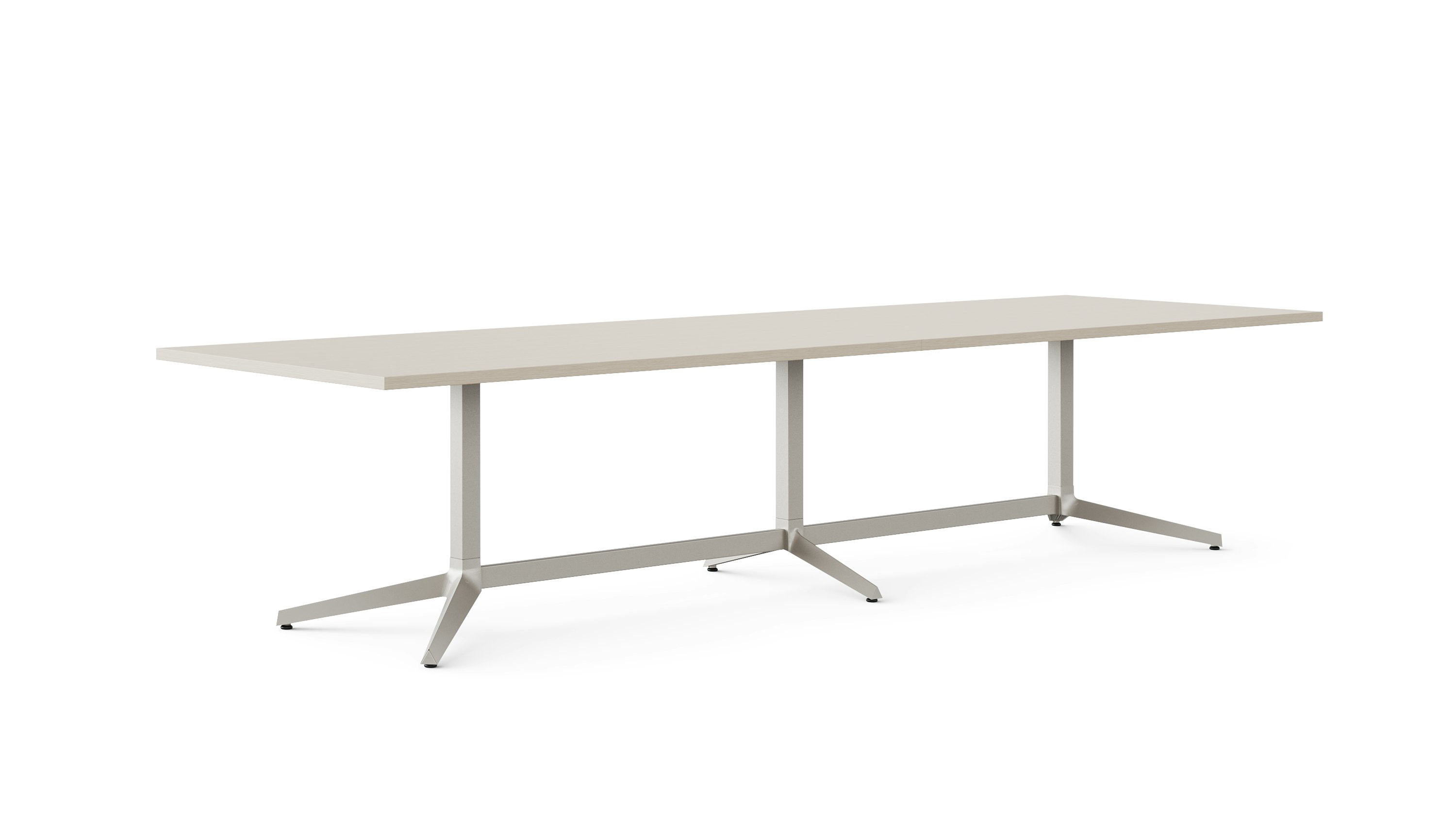 A long rectangular meeting table is shown at an angle in a light color veneer.