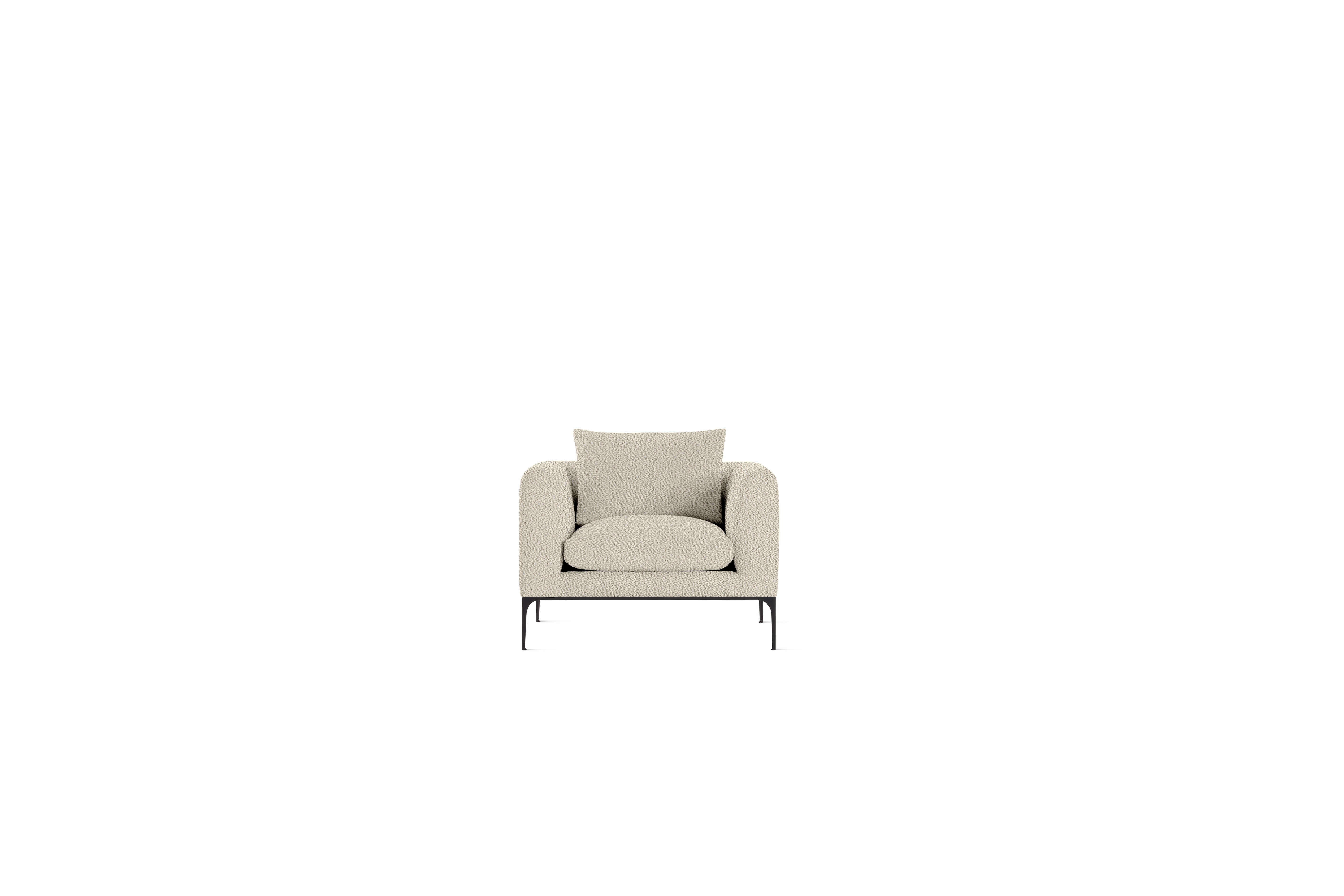 A Jonas Armchair in Turf, Cream Melange with Black finish viewed from the front.