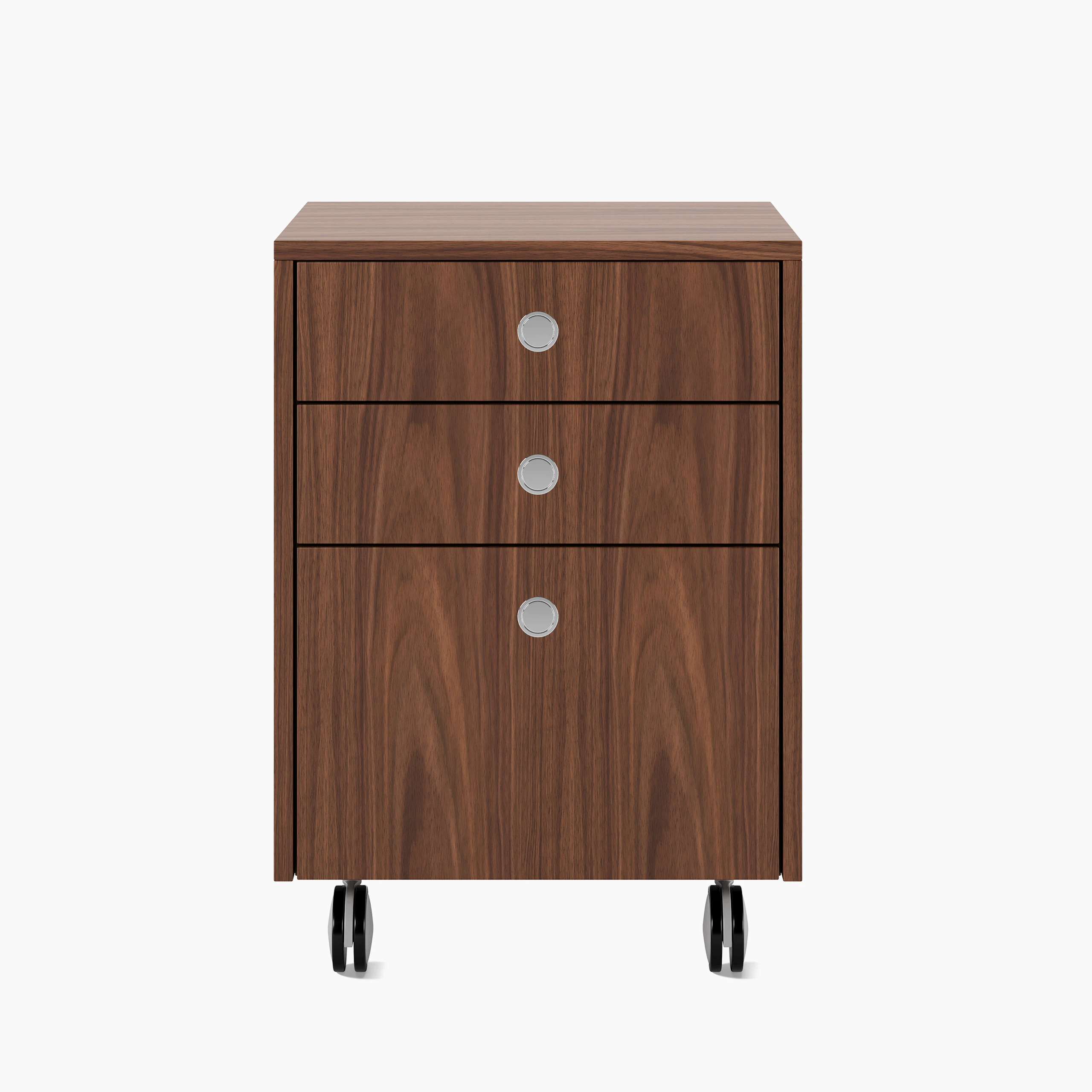 Sled Base Mobile Pedestal in walnut with three drawers and chrome pulls on casters viewed from the font.