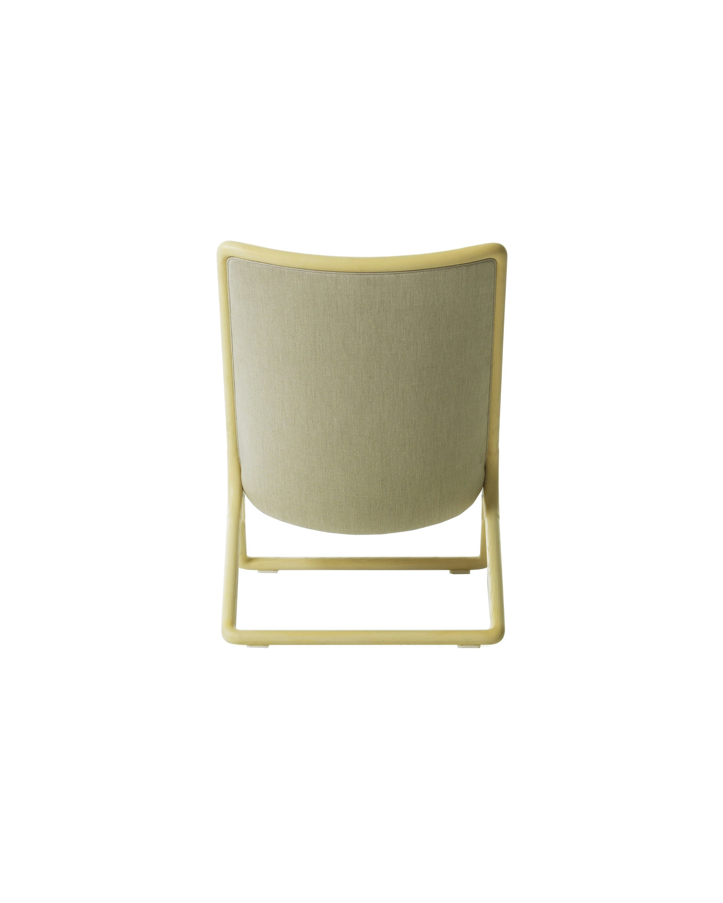 Scissor chair in white ash upholstered in a beige fabric as viewed from the back.