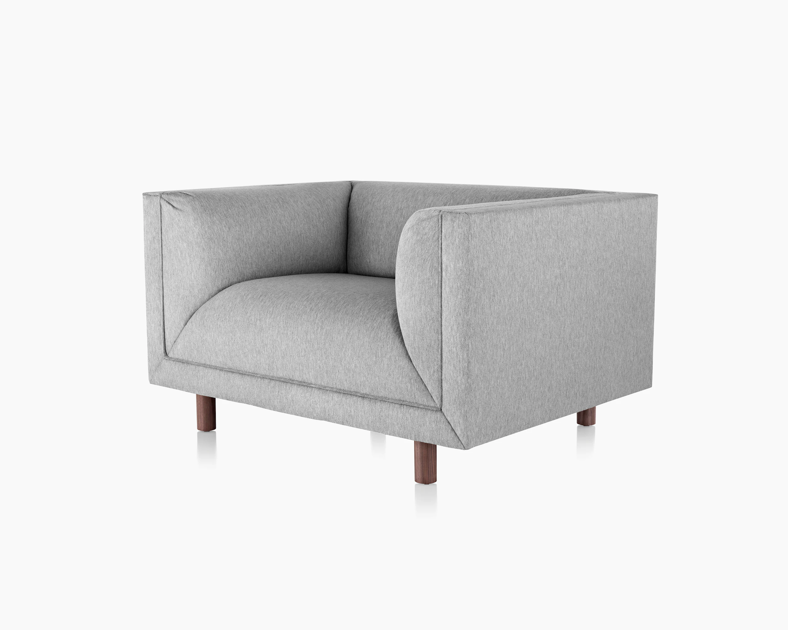 Angled view of a light gray club chair from the Rolled Arm Sofa Group, showing the low seat height.