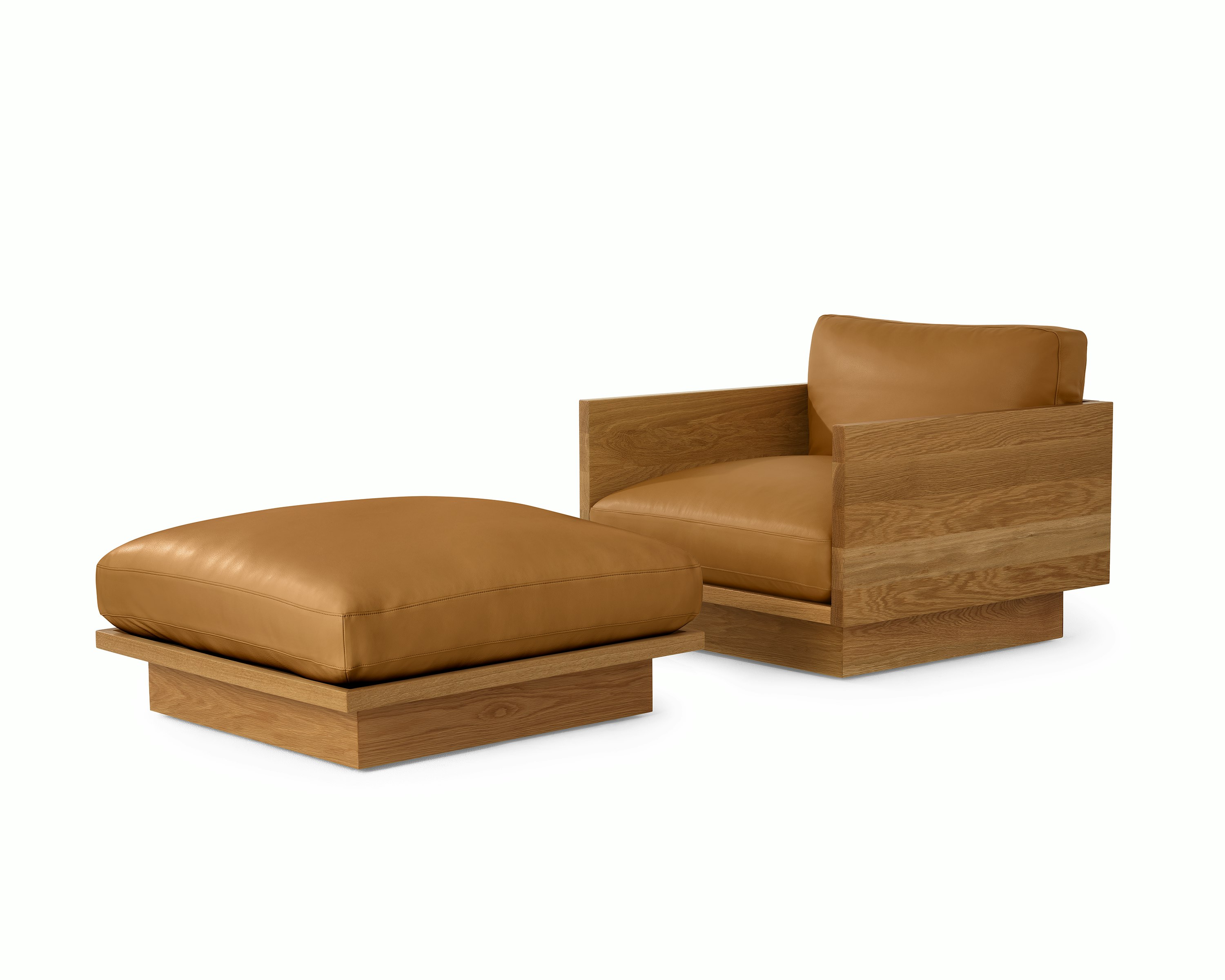 Pawson Drift Lounge Chair and Ottoman with white oak frame and light brown leather upholstery.