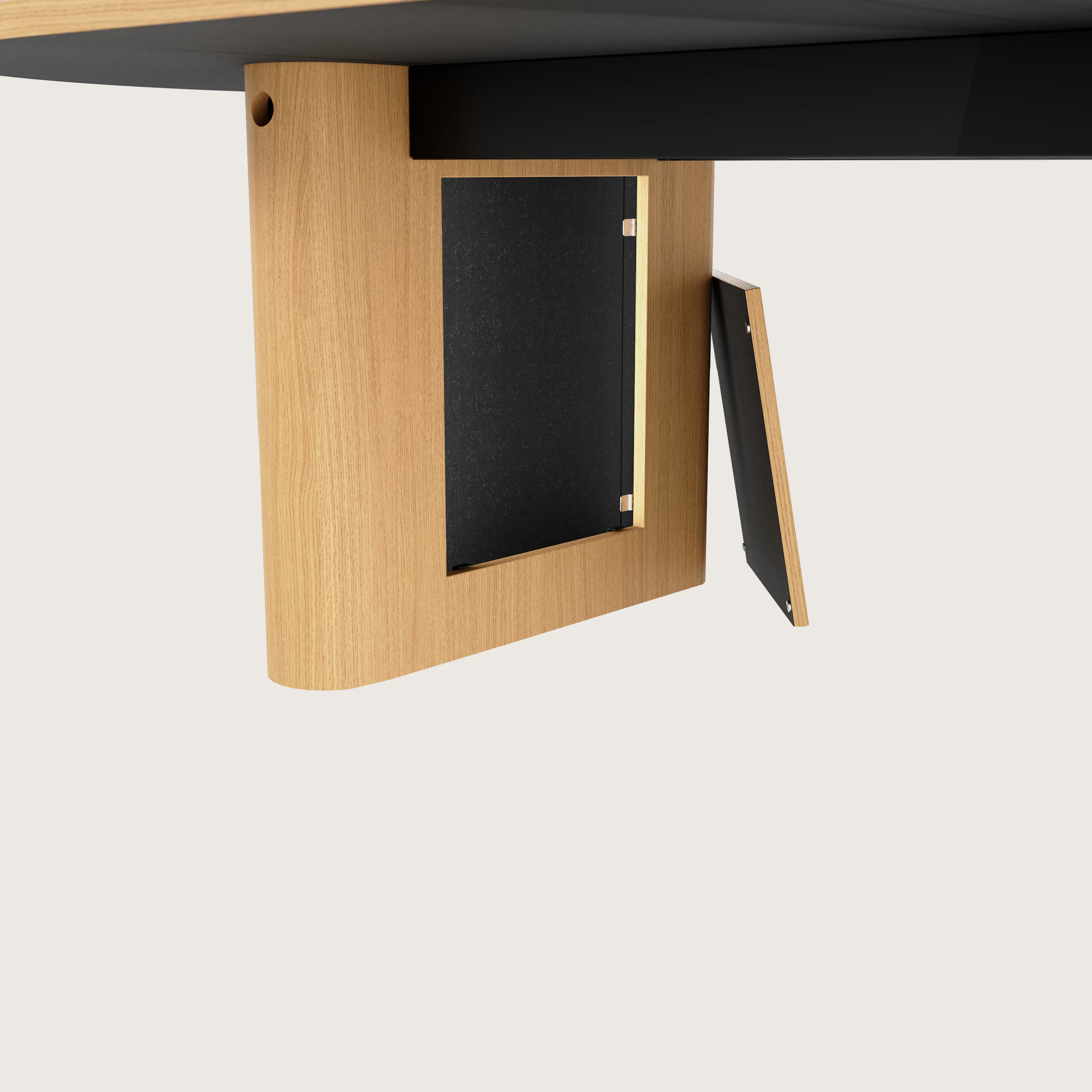 Detail shot of open wire management leg on JD Conference Table in Natural Rift Cut Oak with a racetrack-shaped base.