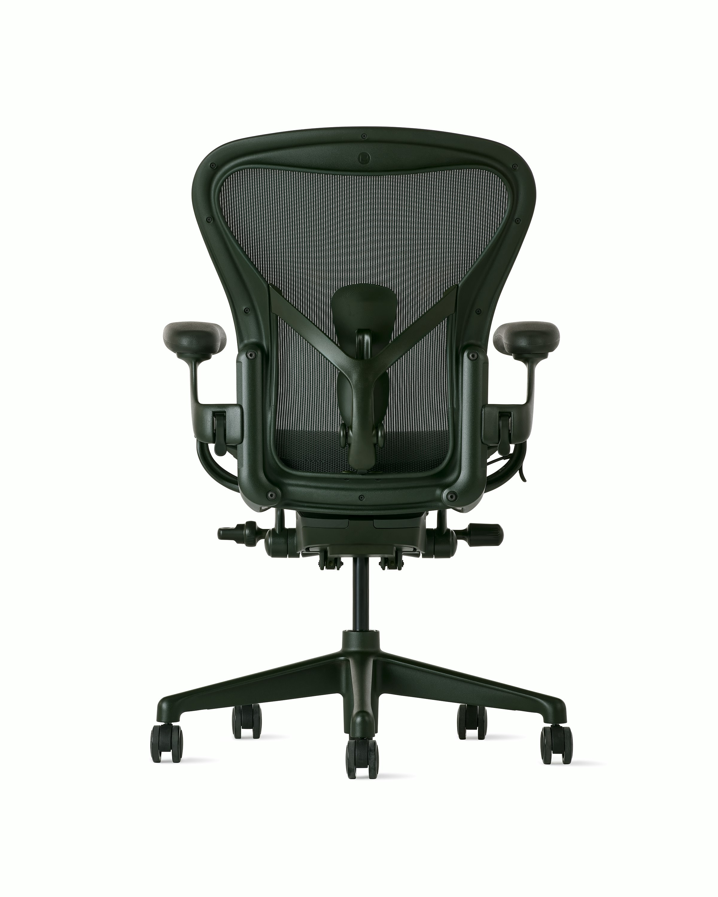 Rear view of an Aeron chair in dark green with PostureFit SL.