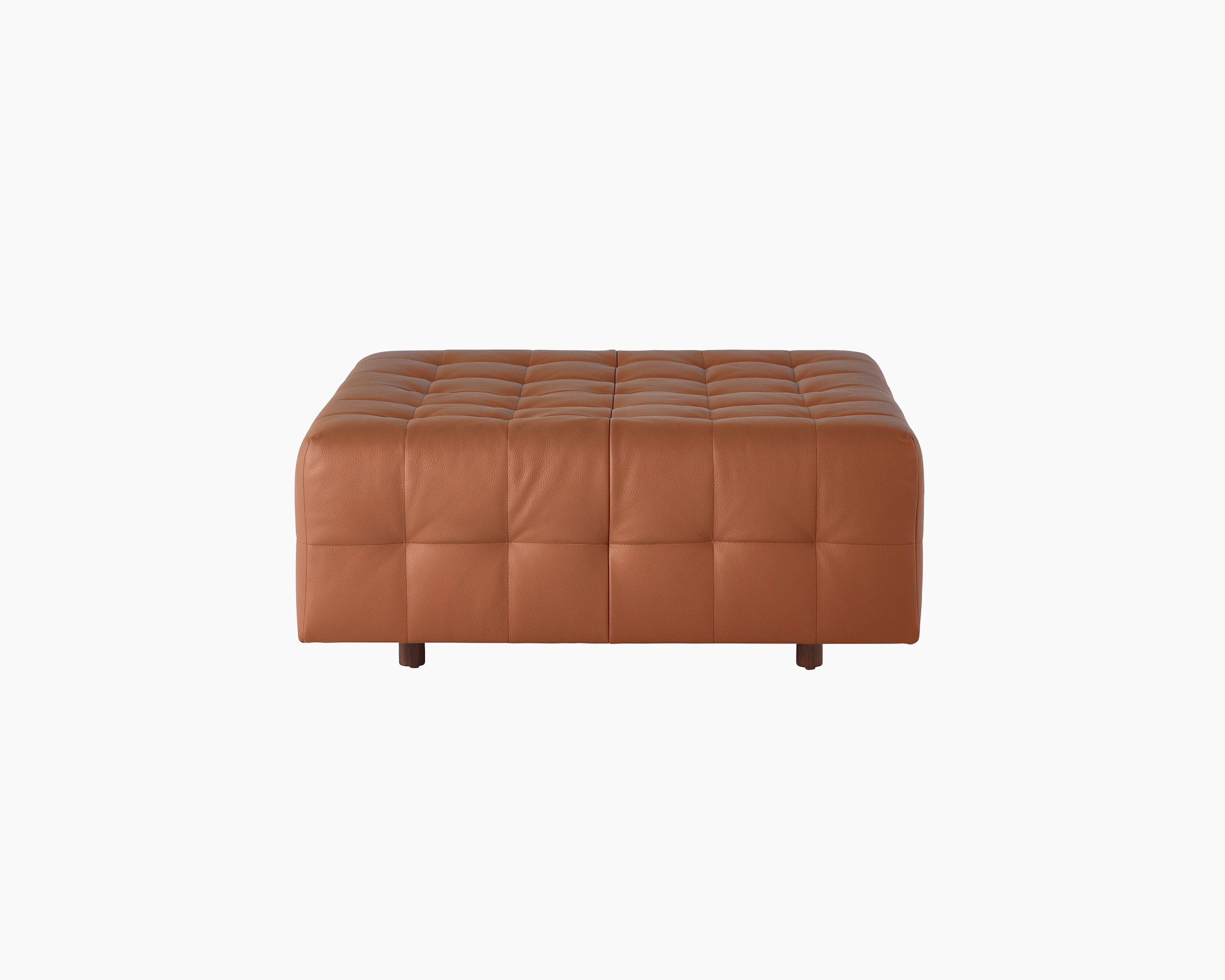 A Rapport ottoman upholstered in leather.
