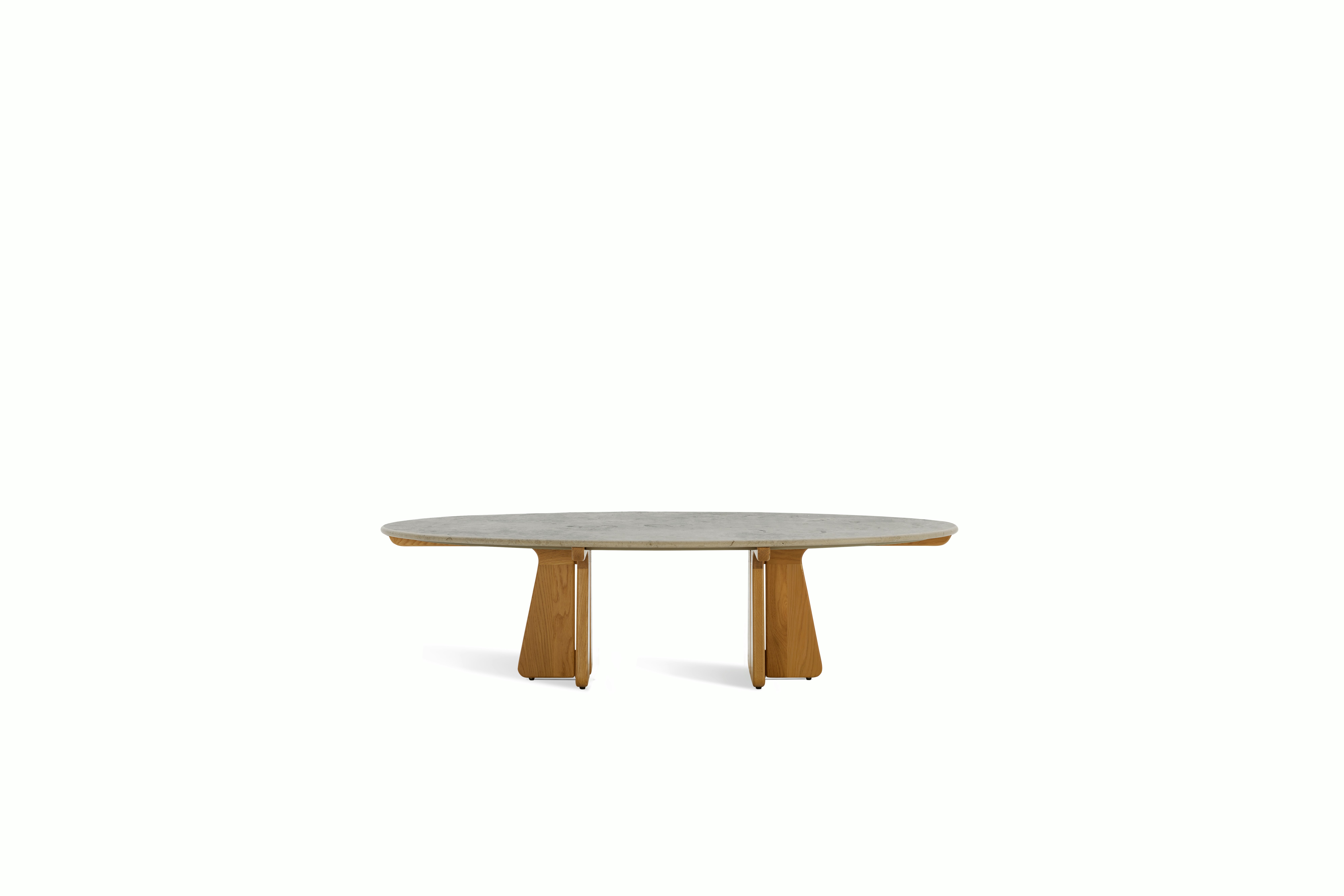 A Pinna Coffee Table in Jura Blau Oak viewed from the front.