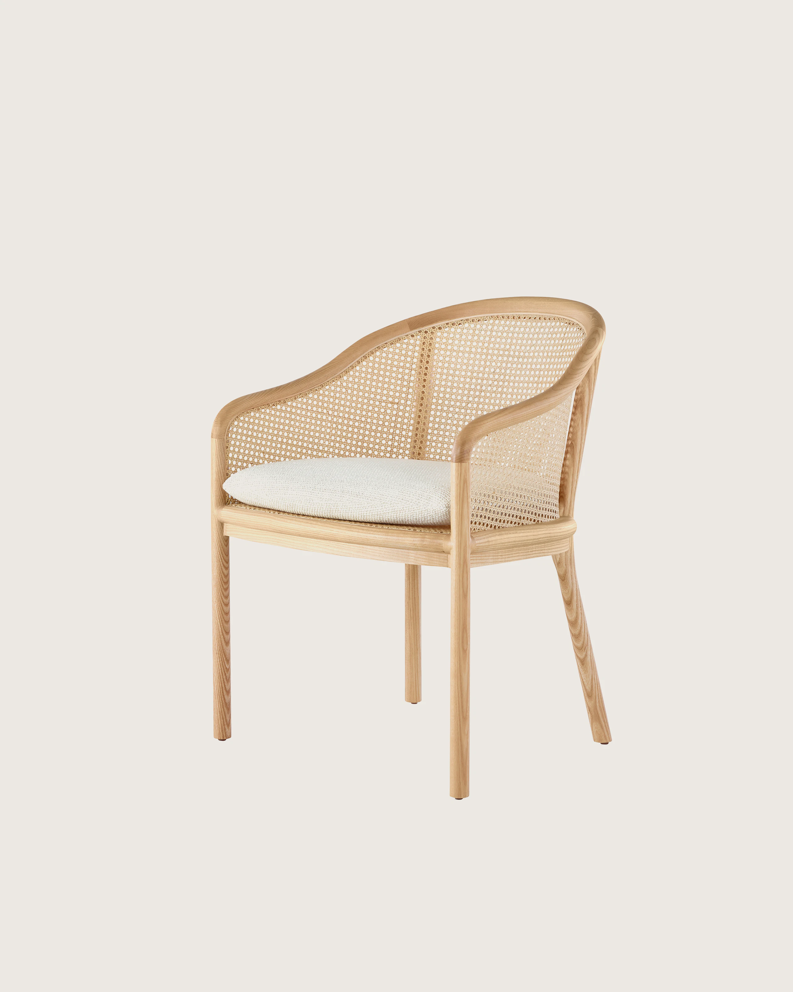 Angled view of a Landmark side chair with a cane back.