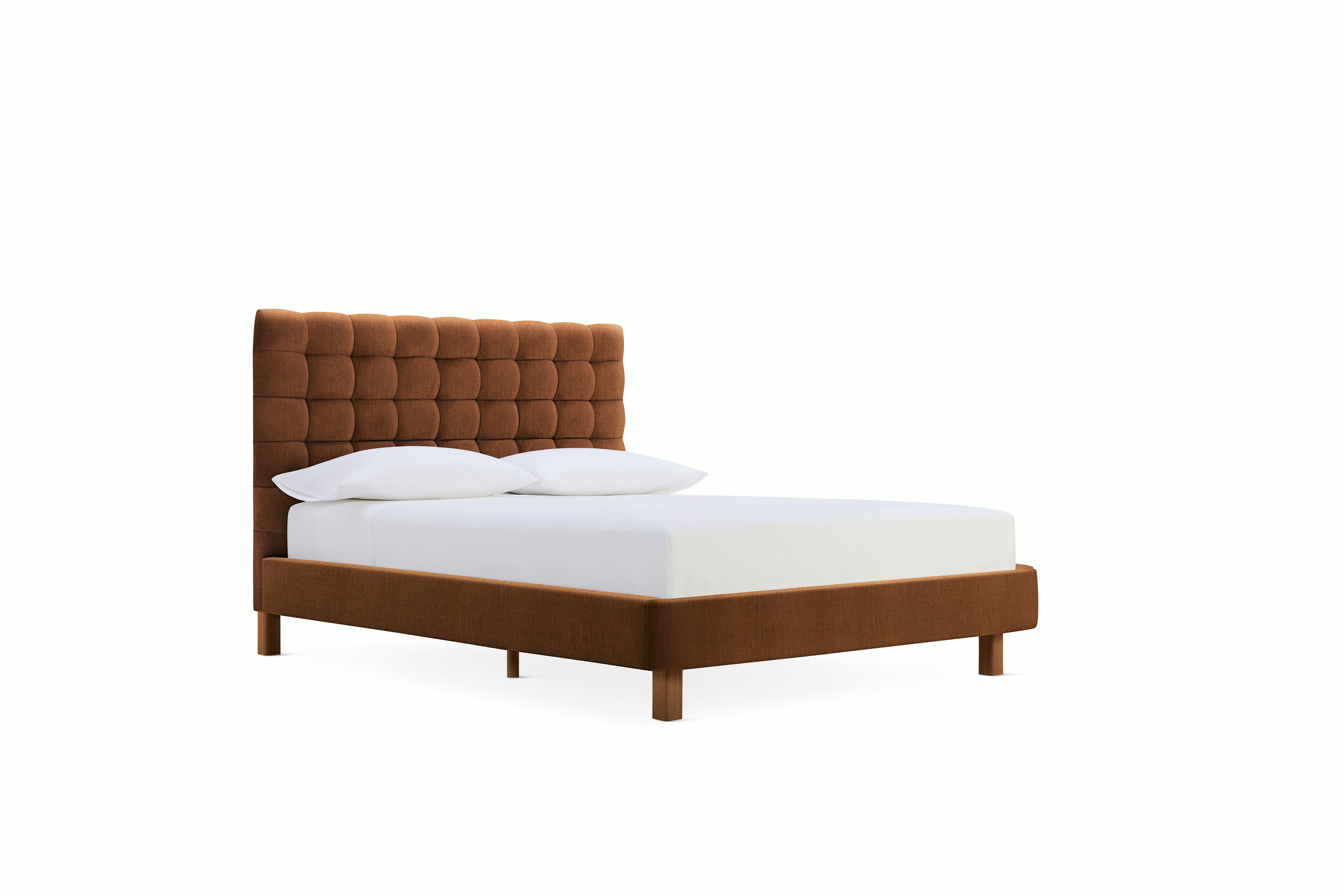 A Madeleine Bed in  Rattan viewed from the front.