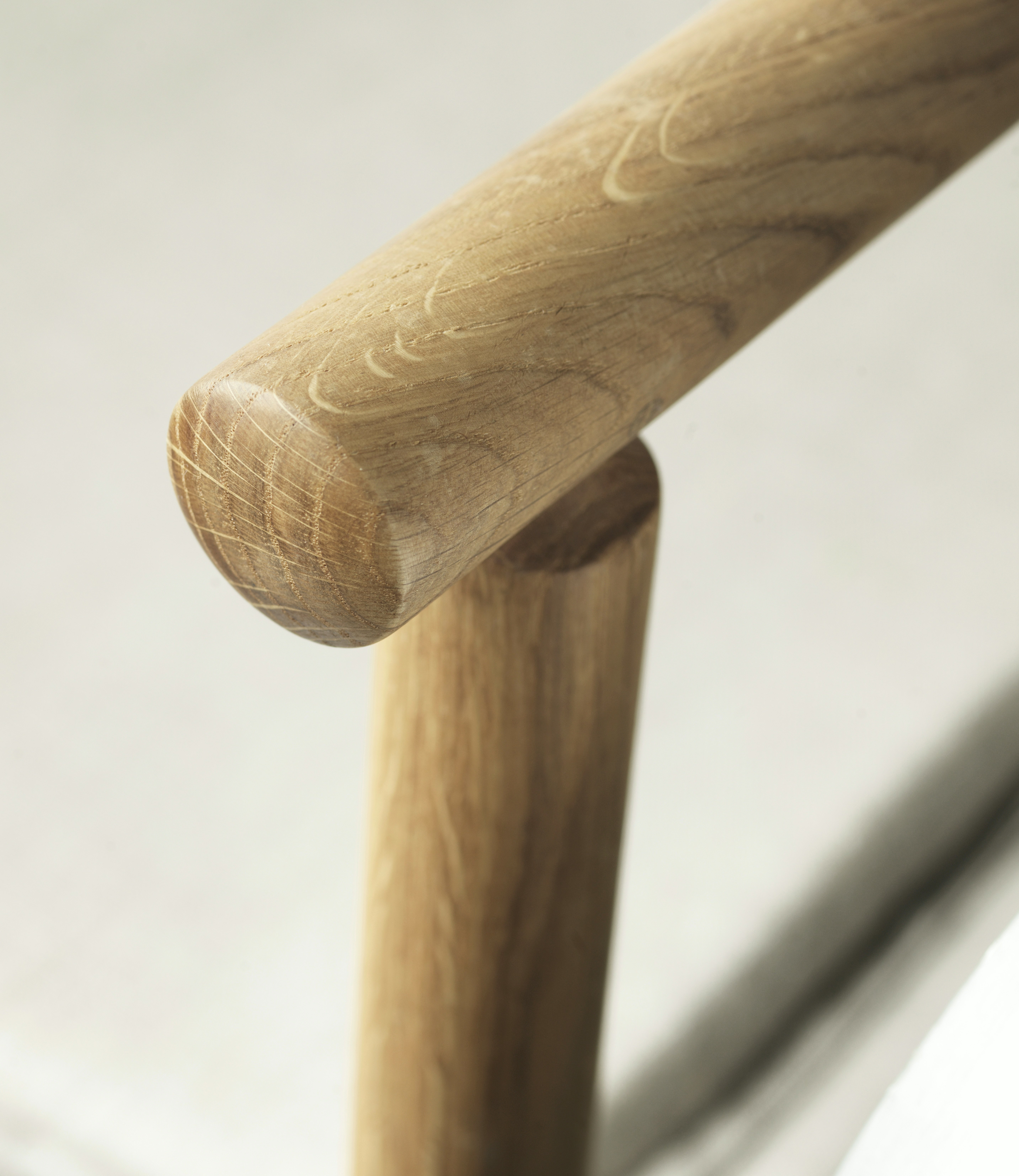 A detailed look at a J138 Folding Chair in Oiled Oak.