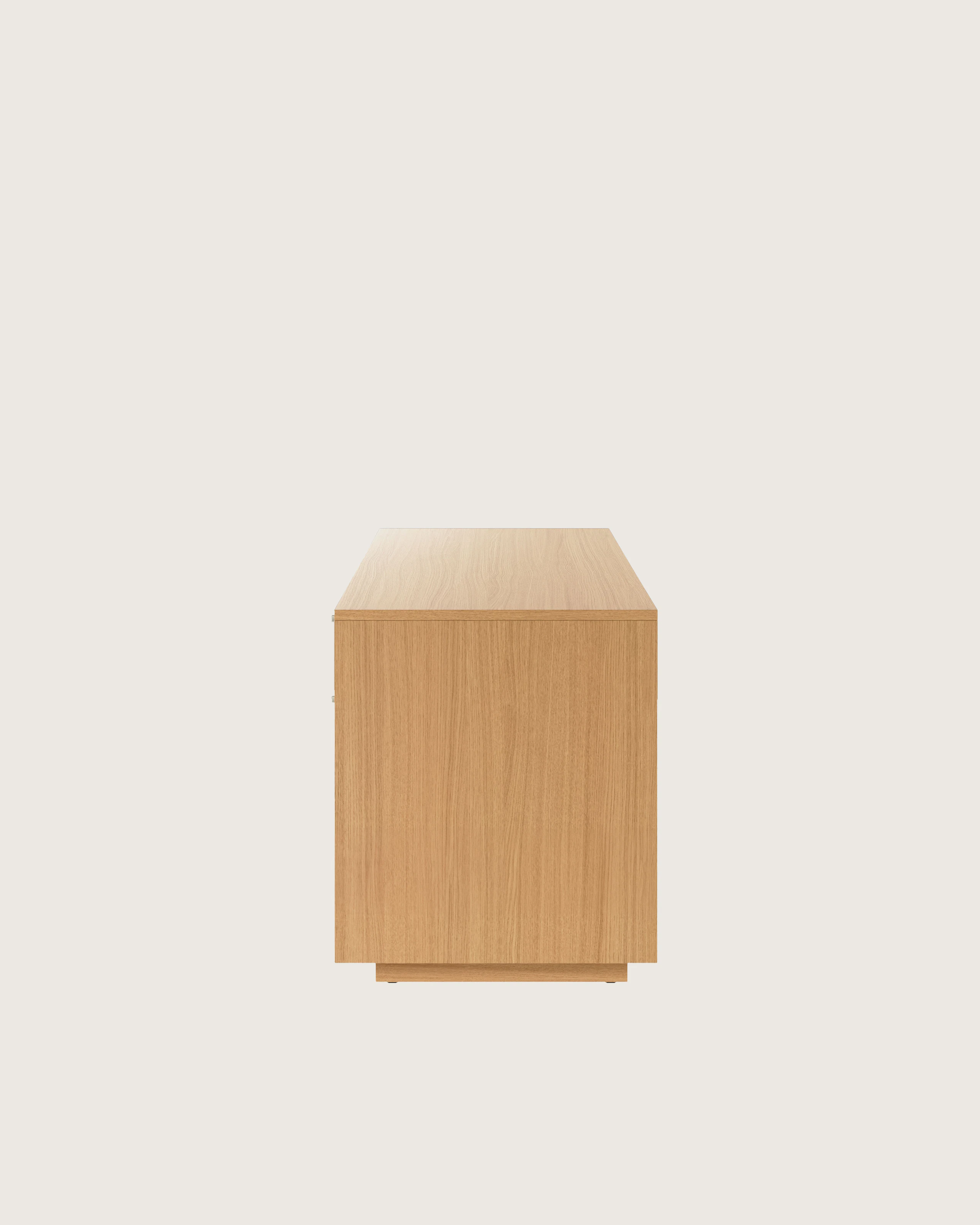 JD Credenza in Natural Rift Cut Oak with Satin Nickel drawer pulls viewed from the side.