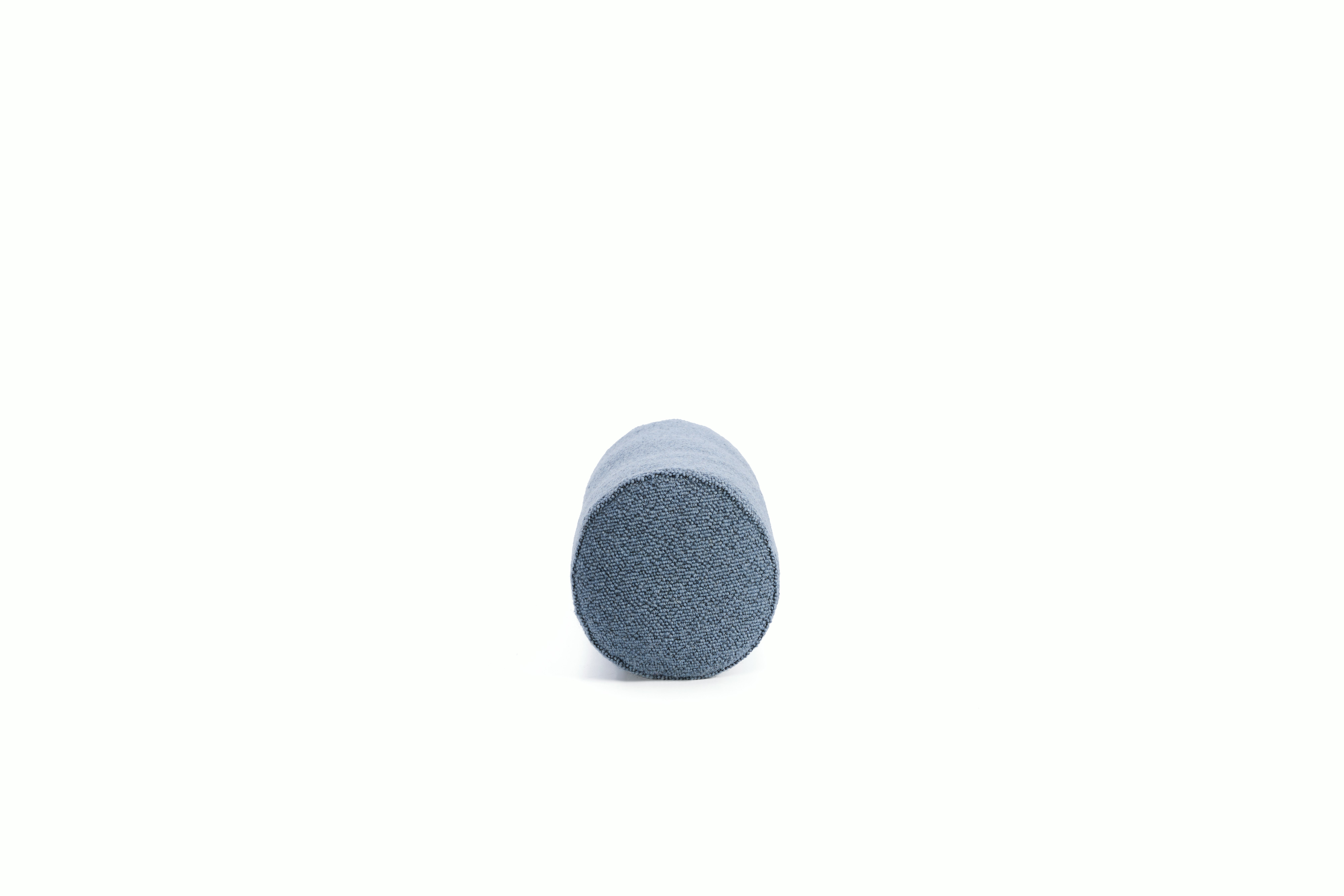 A Turf Boucle Pillow in Blue Grey viewed from the side.