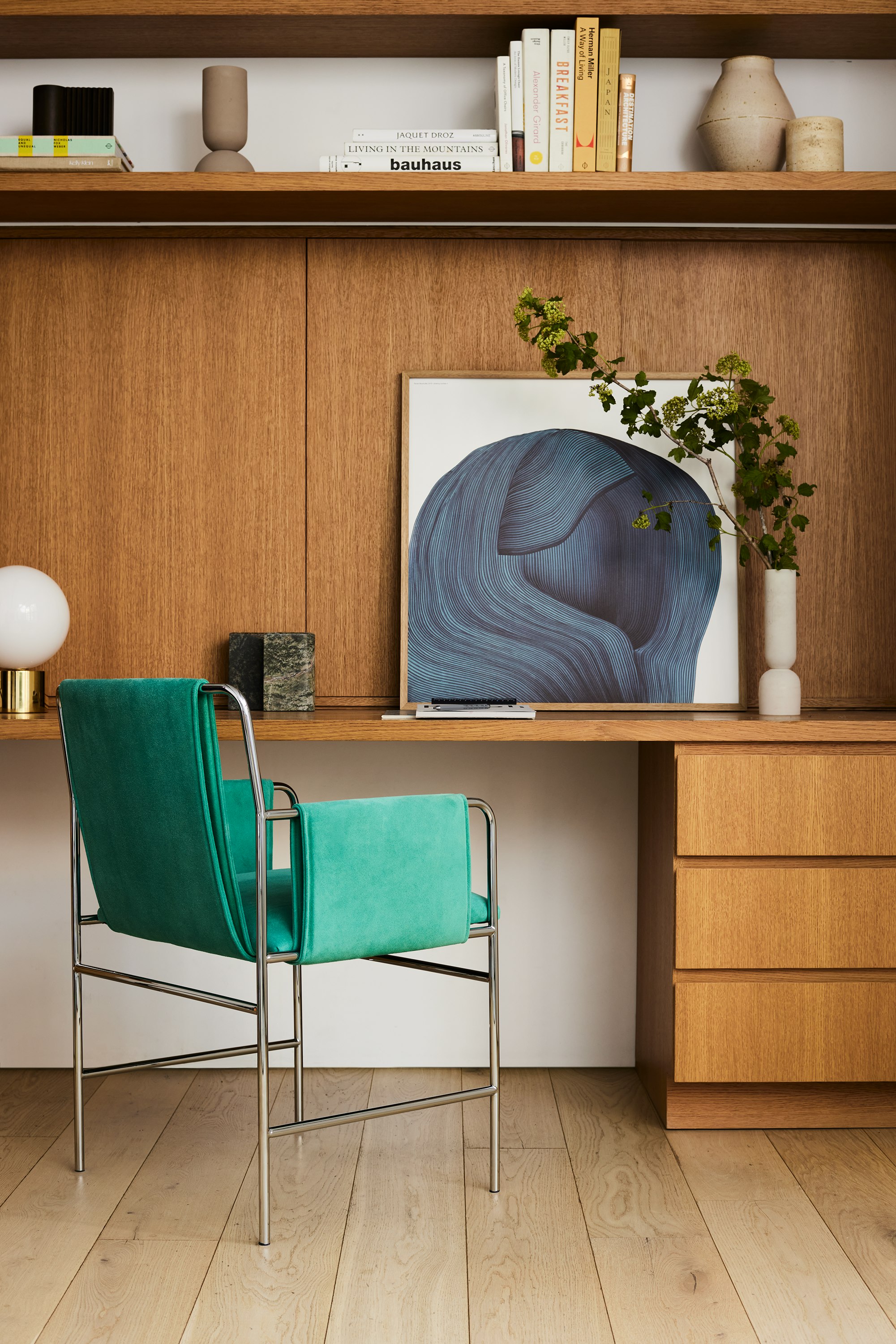 The Envelope Chair in a premium Maharam suede fabric in a home office setting.