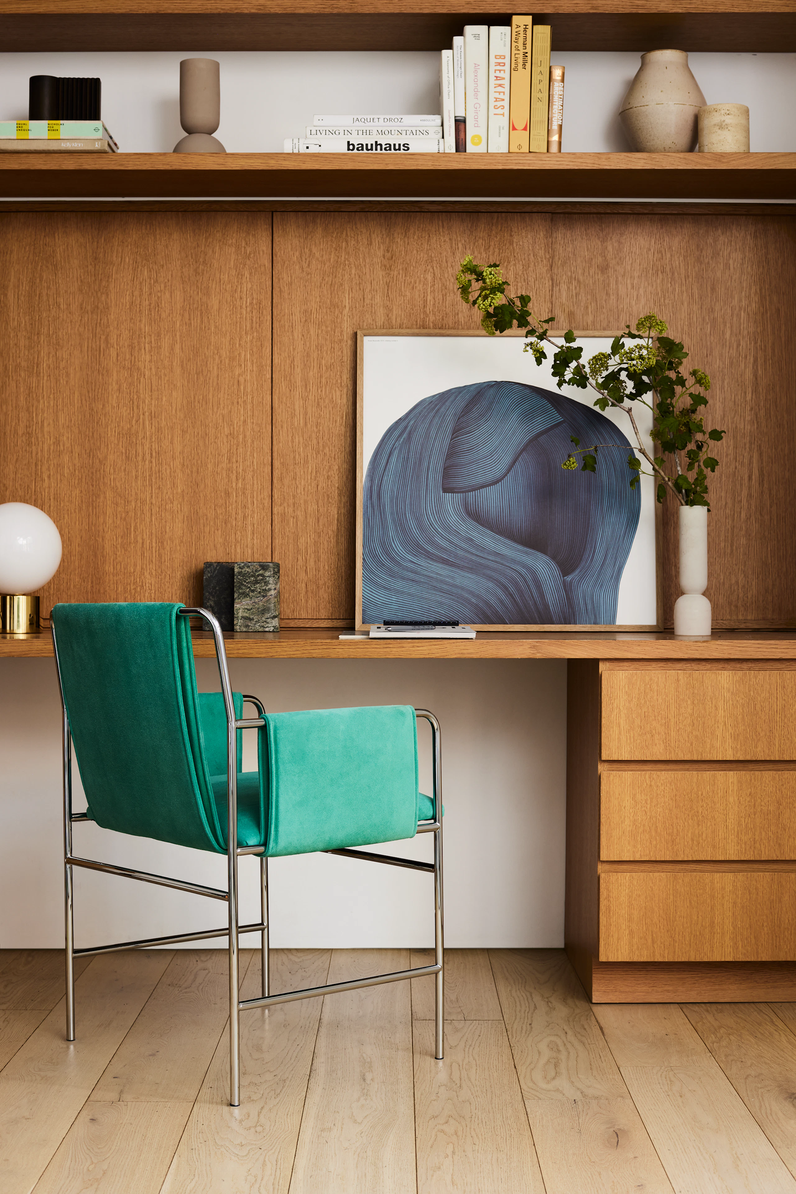 The Envelope Chair in a premium Maharam suede fabric in a home office setting.