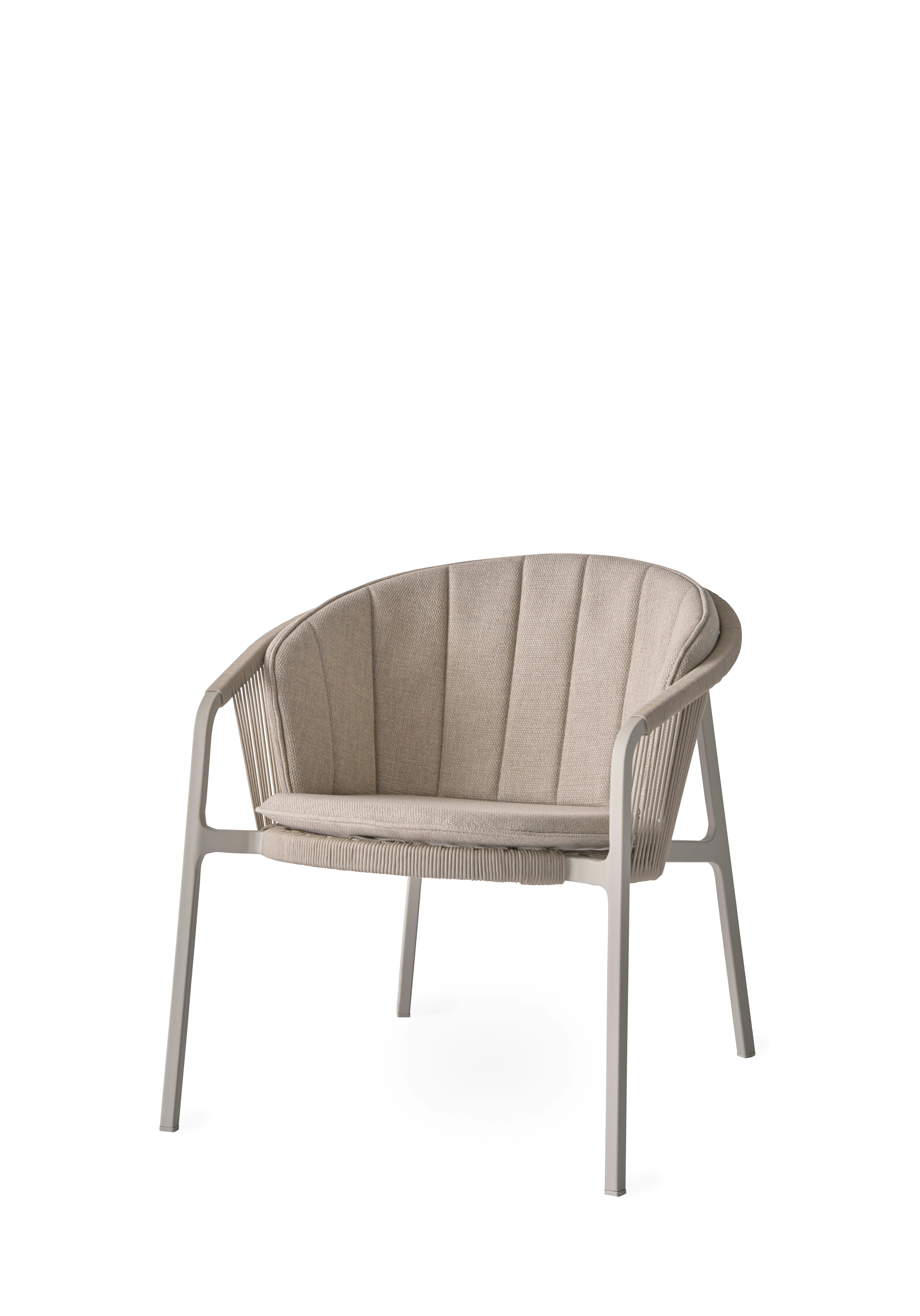A Vipp712 Lagrasse Lounge Chair Viewed from an angle.