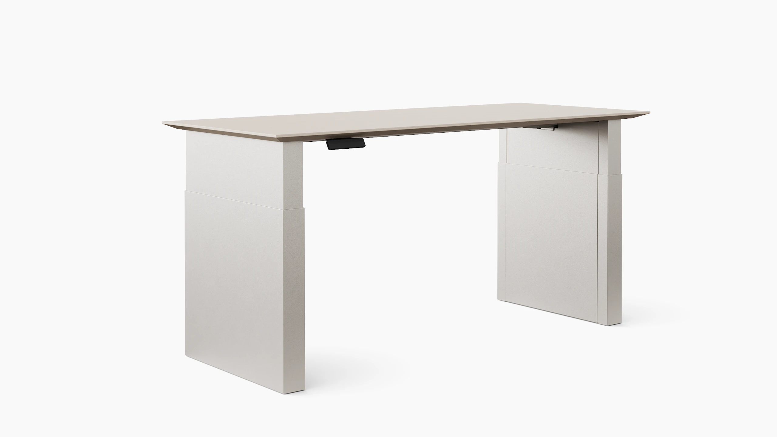 A height adjustable table with shrouded legs is shown in light finishes.