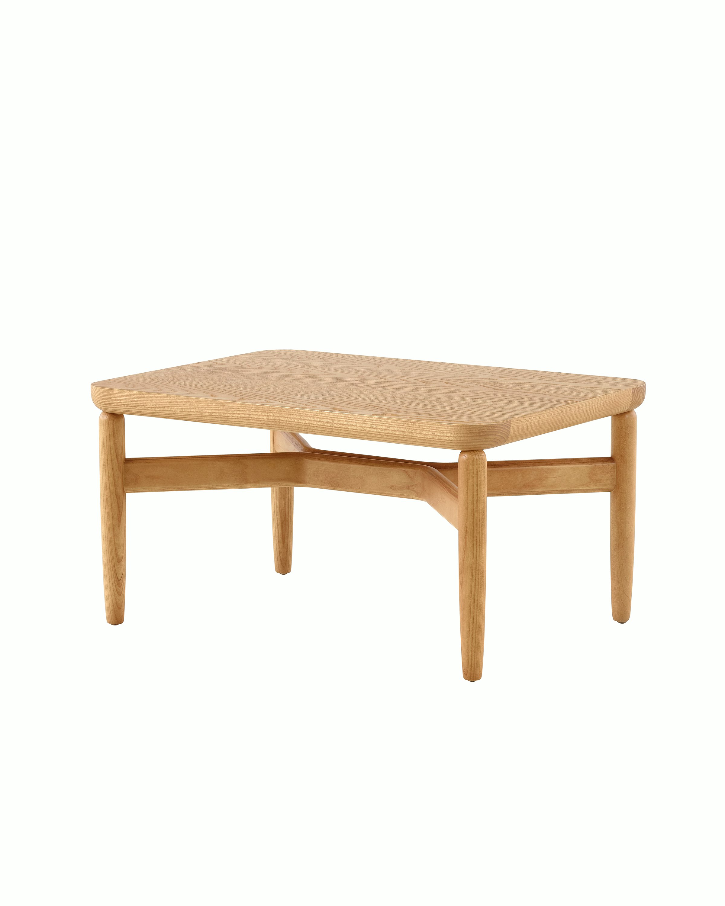 A Reframe Rectangular Table in Rift Oak, viewed from a three-quarter perspective.