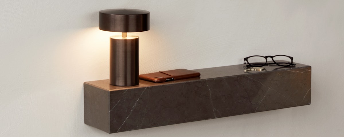 Column Table Lamp on a Plinth Wall Shelf in an entryway setting