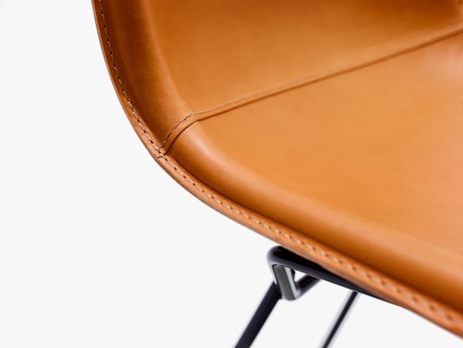 bertoia leather covered side chair
