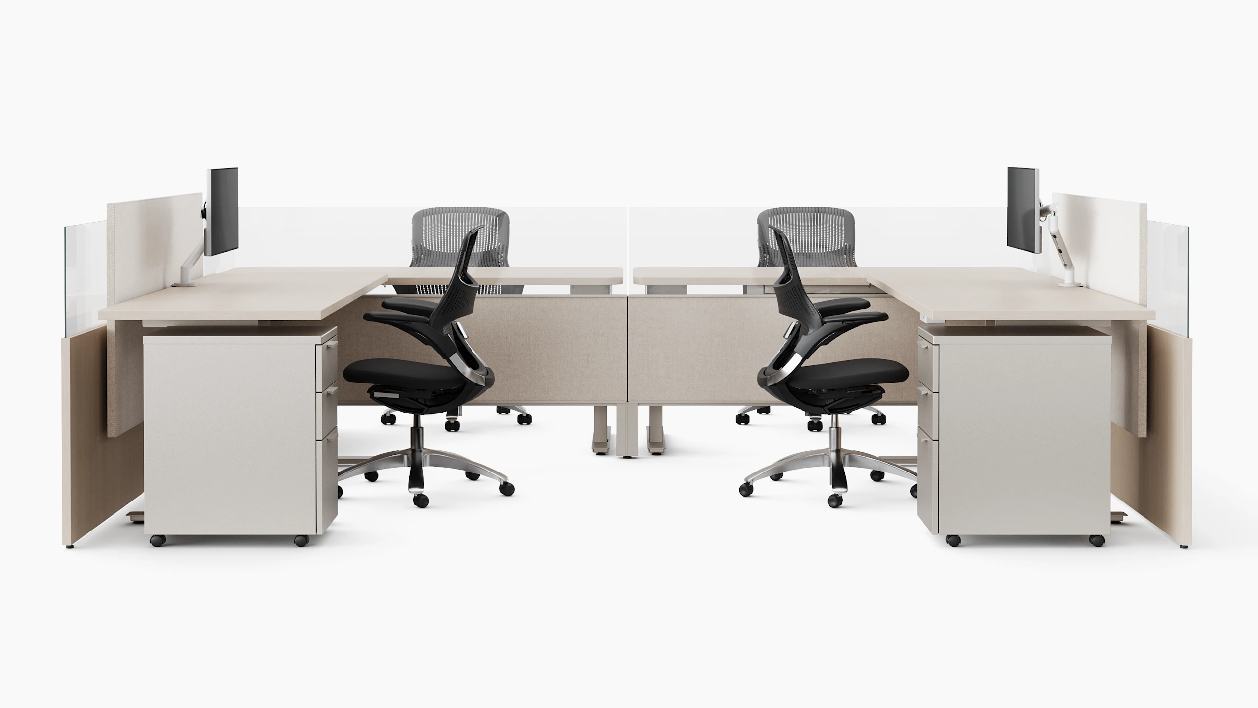 A group of workstations in a light color veneer are shown straight on.