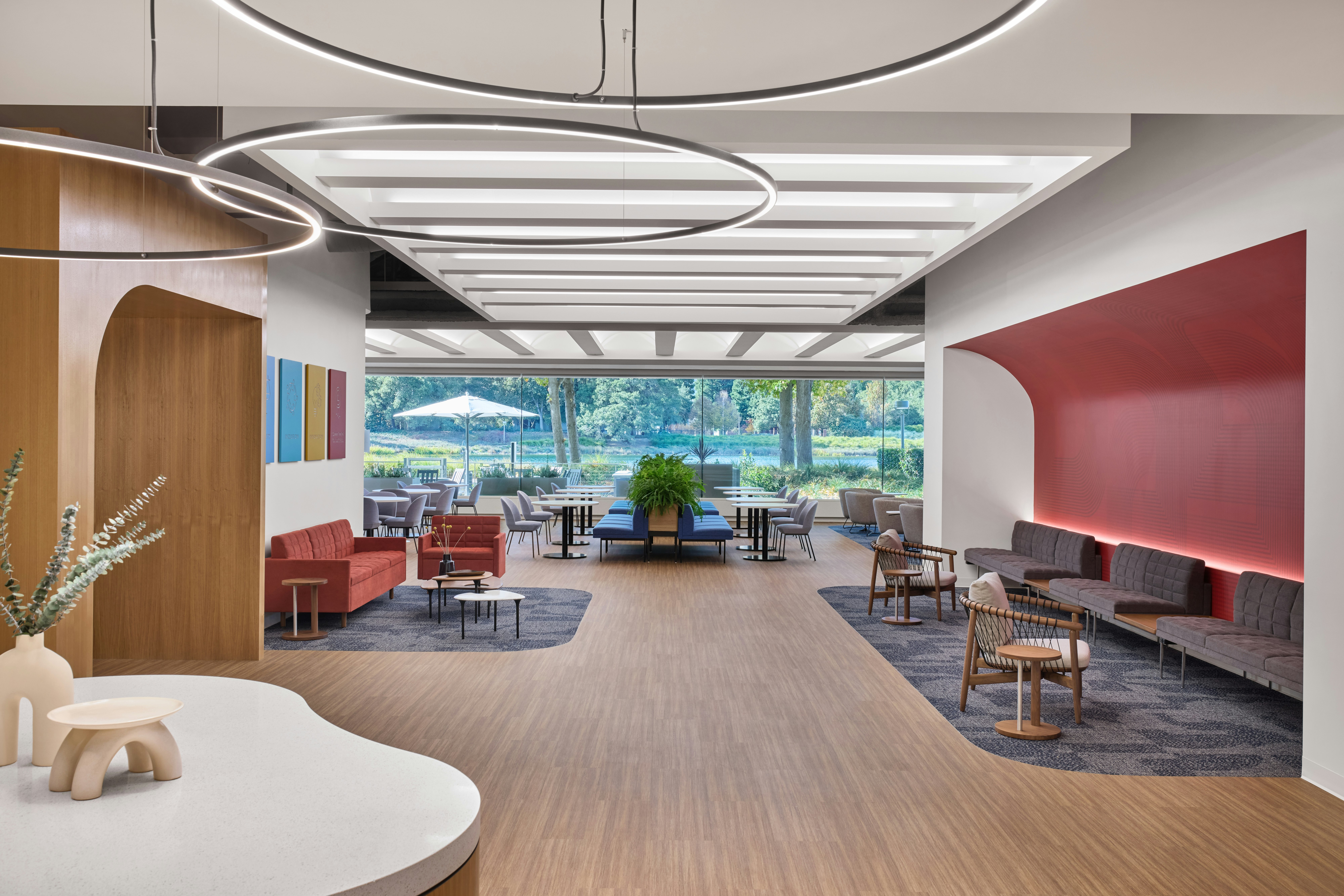 Large communal seating area furnished with Geiger Tuxedo Sofas at the Robert Half headquarters in San Francisco.