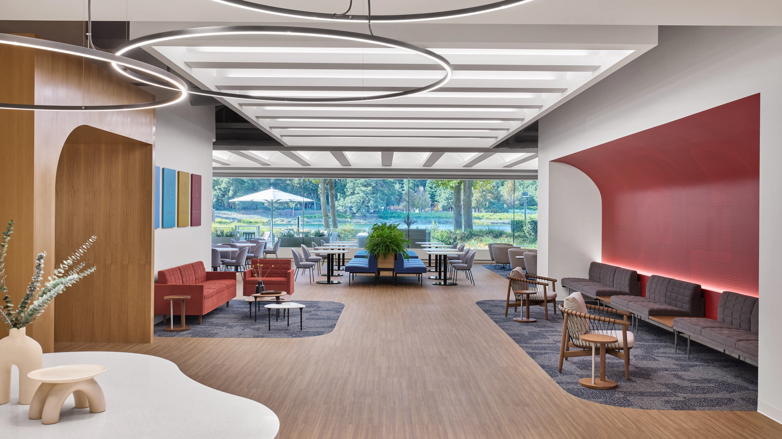 Large communal seating area furnished with Geiger Tuxedo Sofas at the Robert Half headquarters in San Francisco.