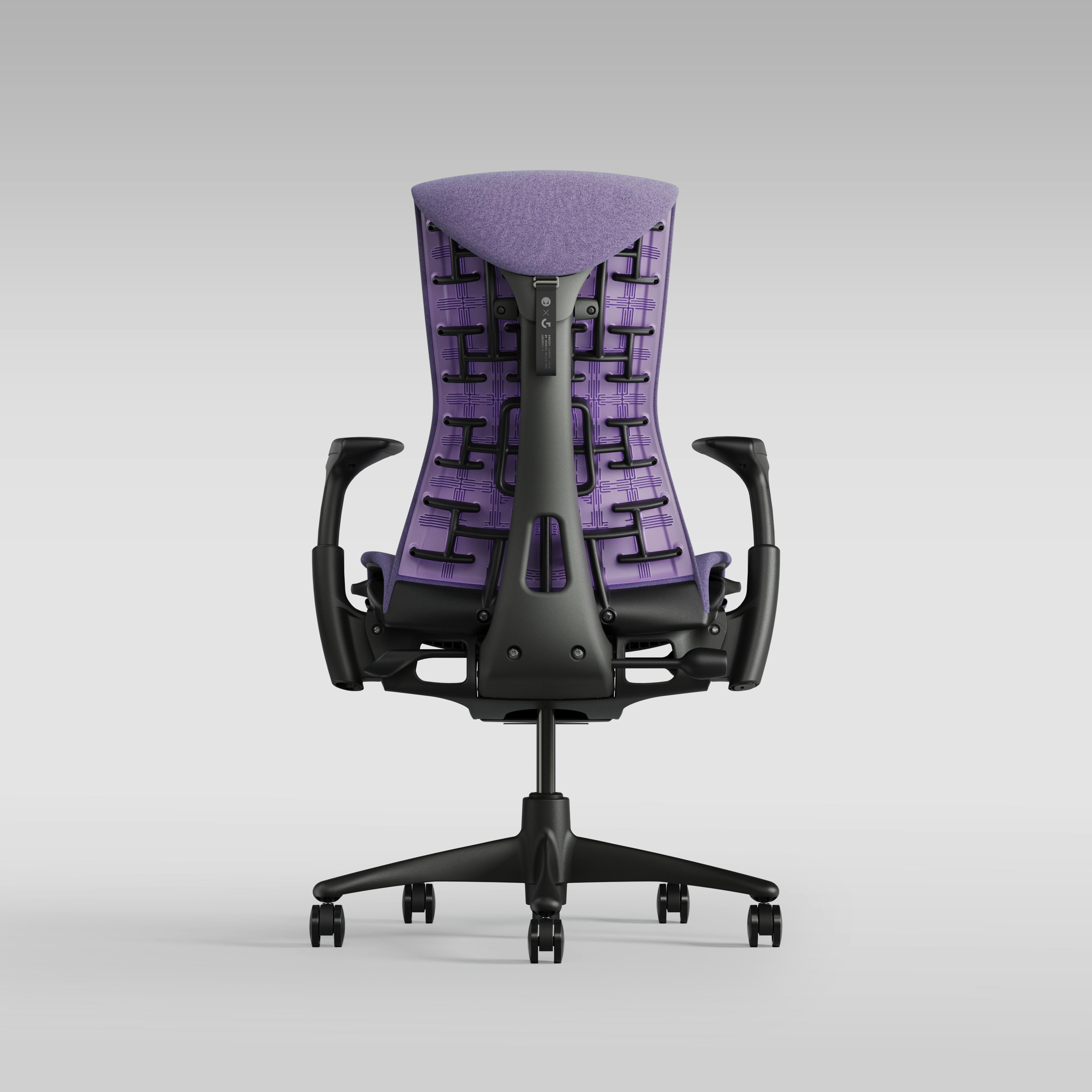 Embody Gaming Chair in Graphite, Amethyst and White viewed from the back