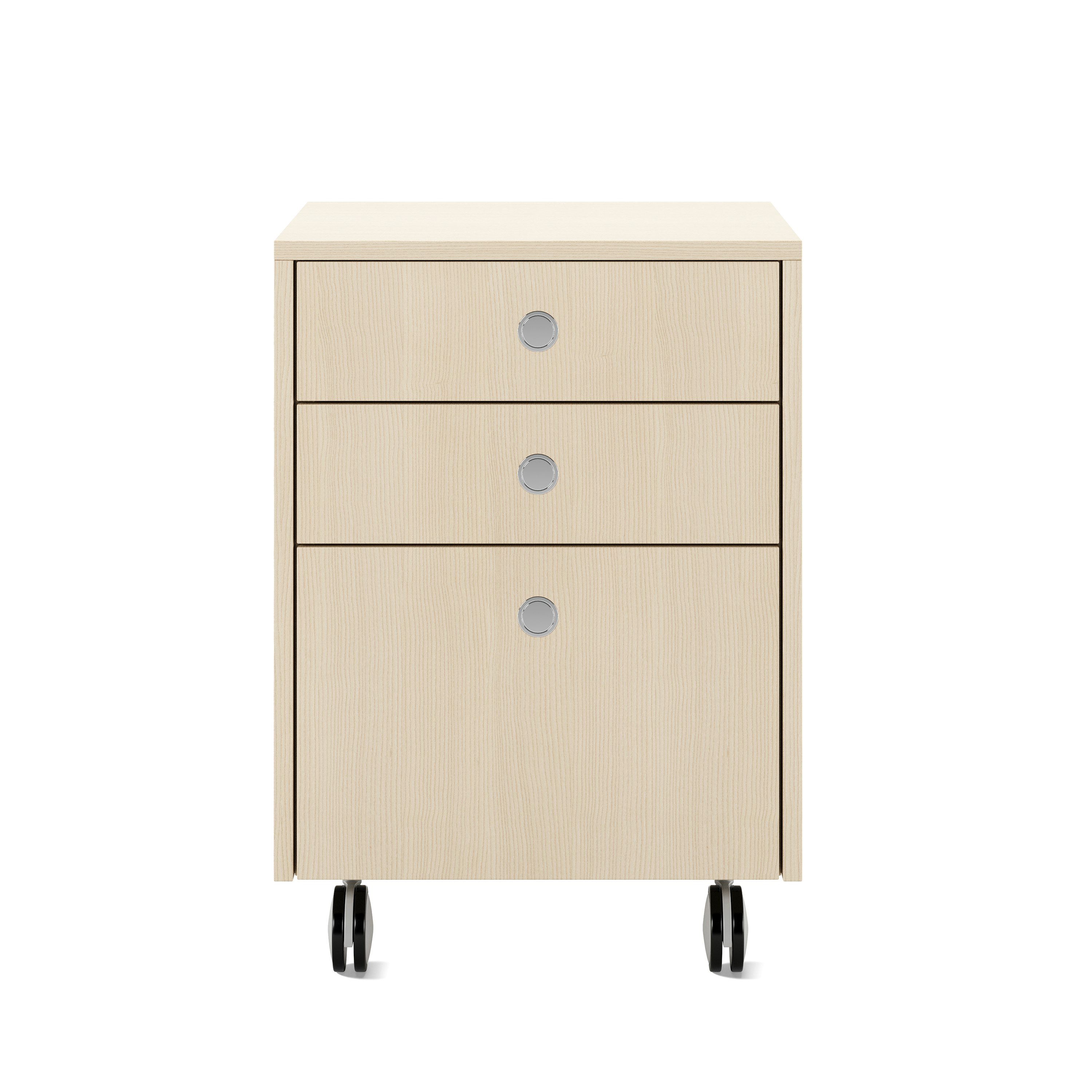 Sled Base Mobile Pedestal in ash with three drawers and chrome pulls on casters viewed from the font.