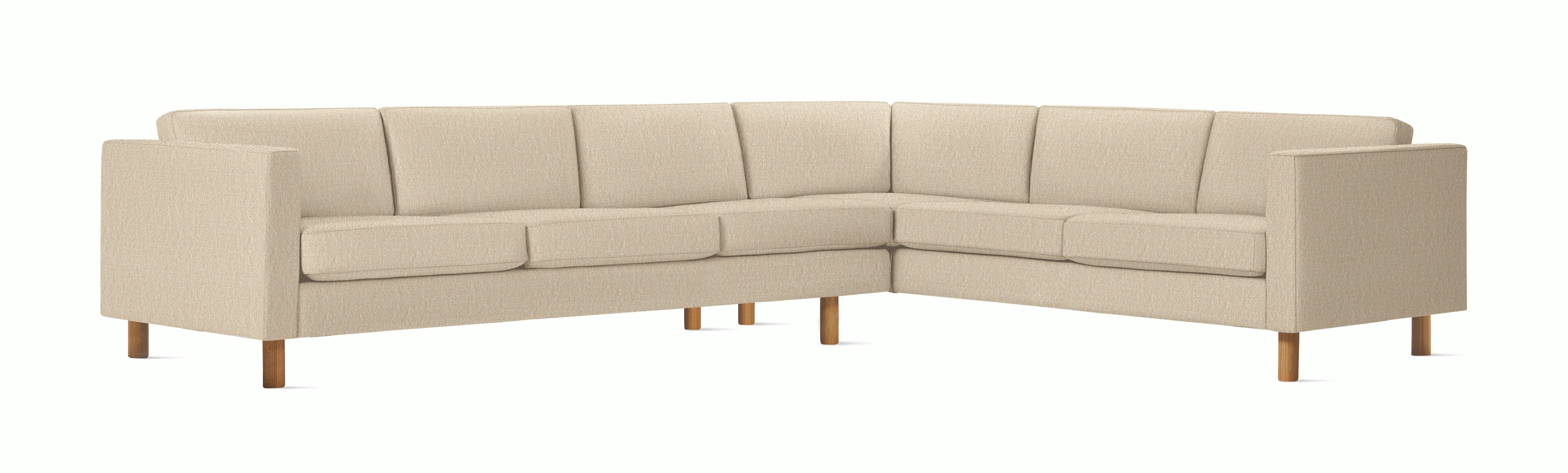 A Lispenard Corner Sectional in Gentle with Oak finish viewed from the front.