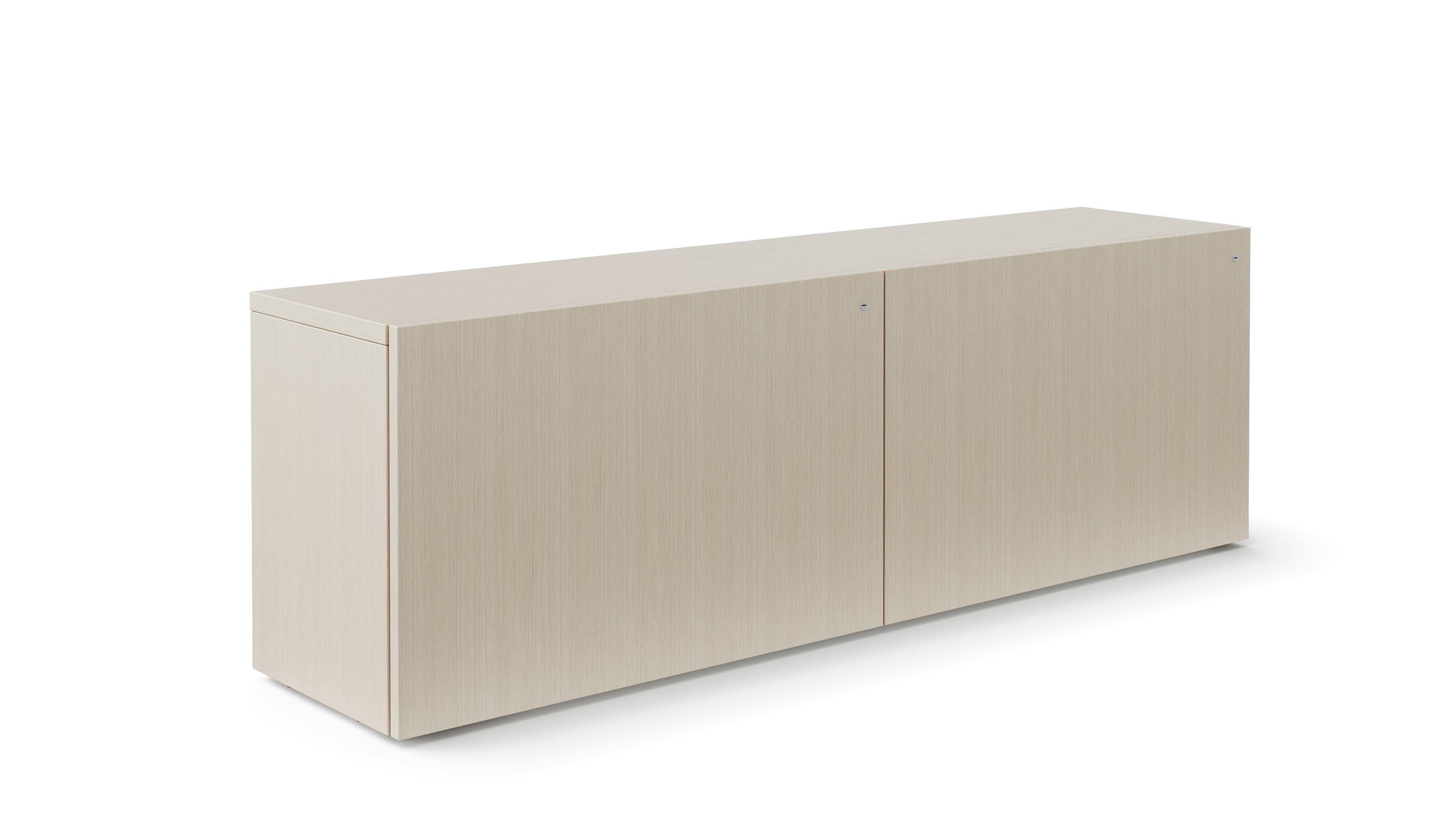 A credenza with closed front doors is viewed in a light veneer.