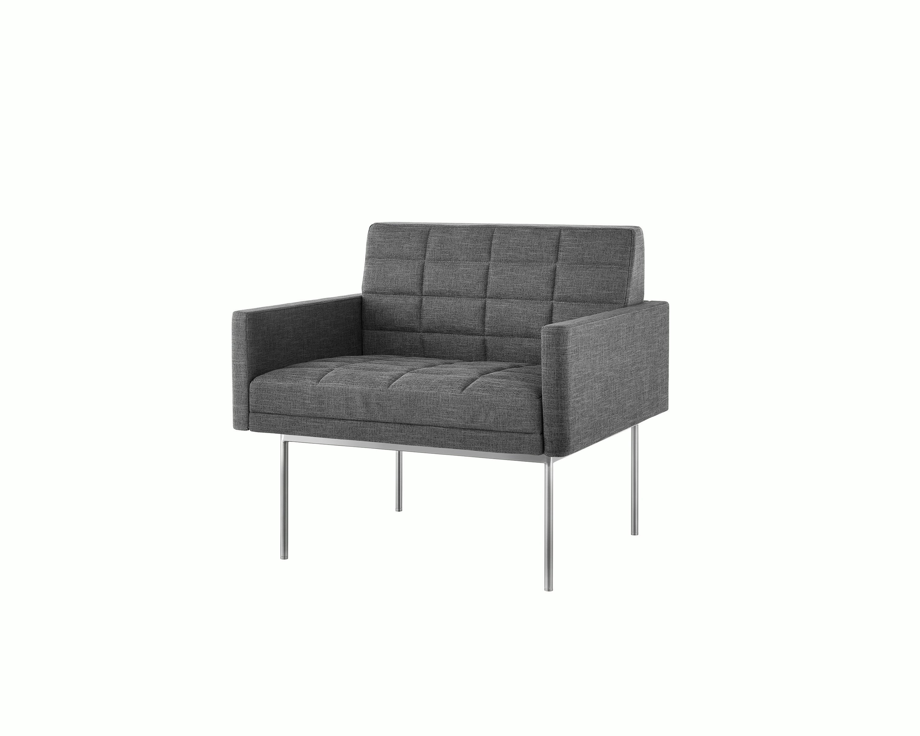 A quilted Tuxedo Component Club Chair with medium gray upholstery and a metal base, viewed at an angle.