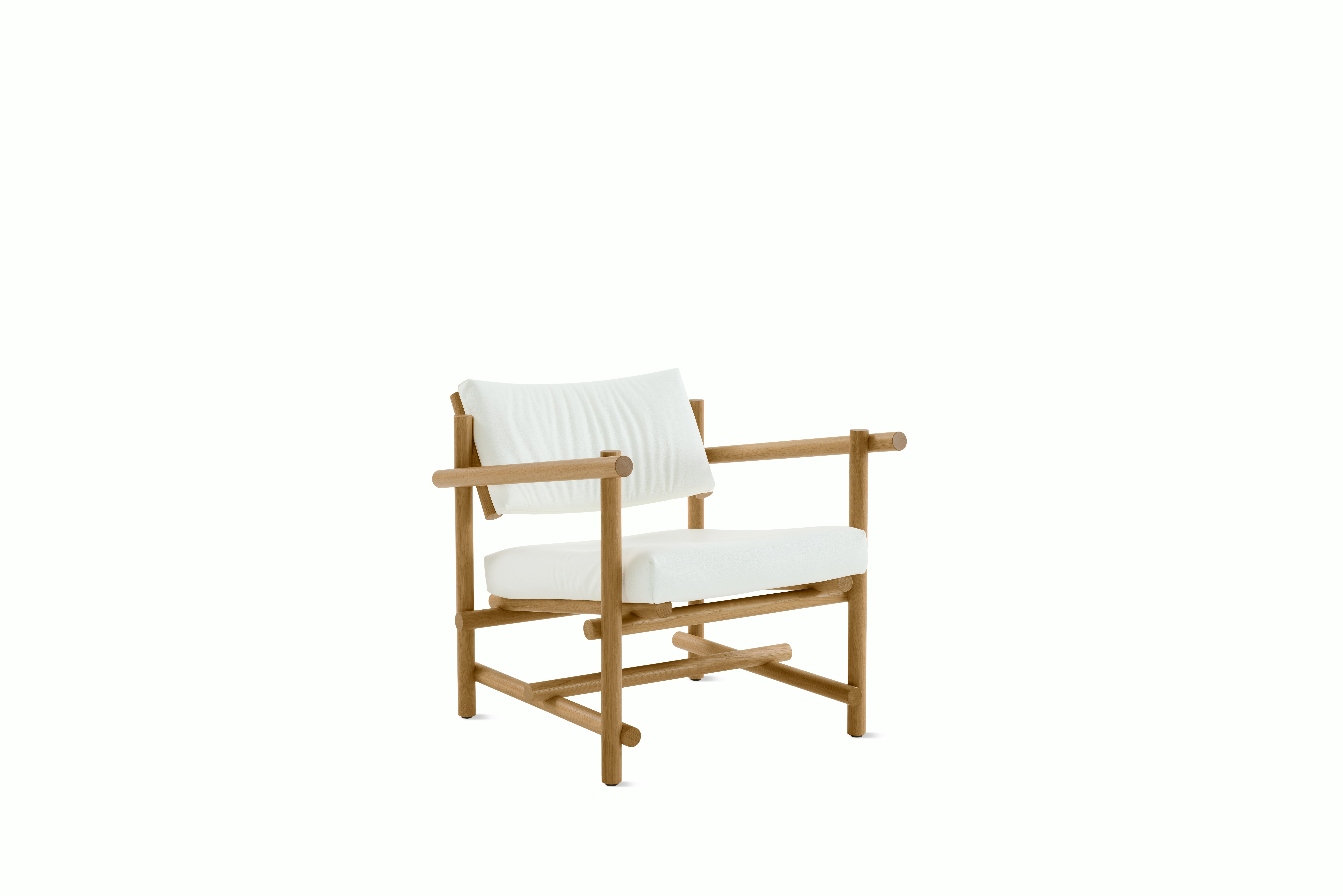 A Muecke Lounge Chair in White White Oak viewed from an angle.