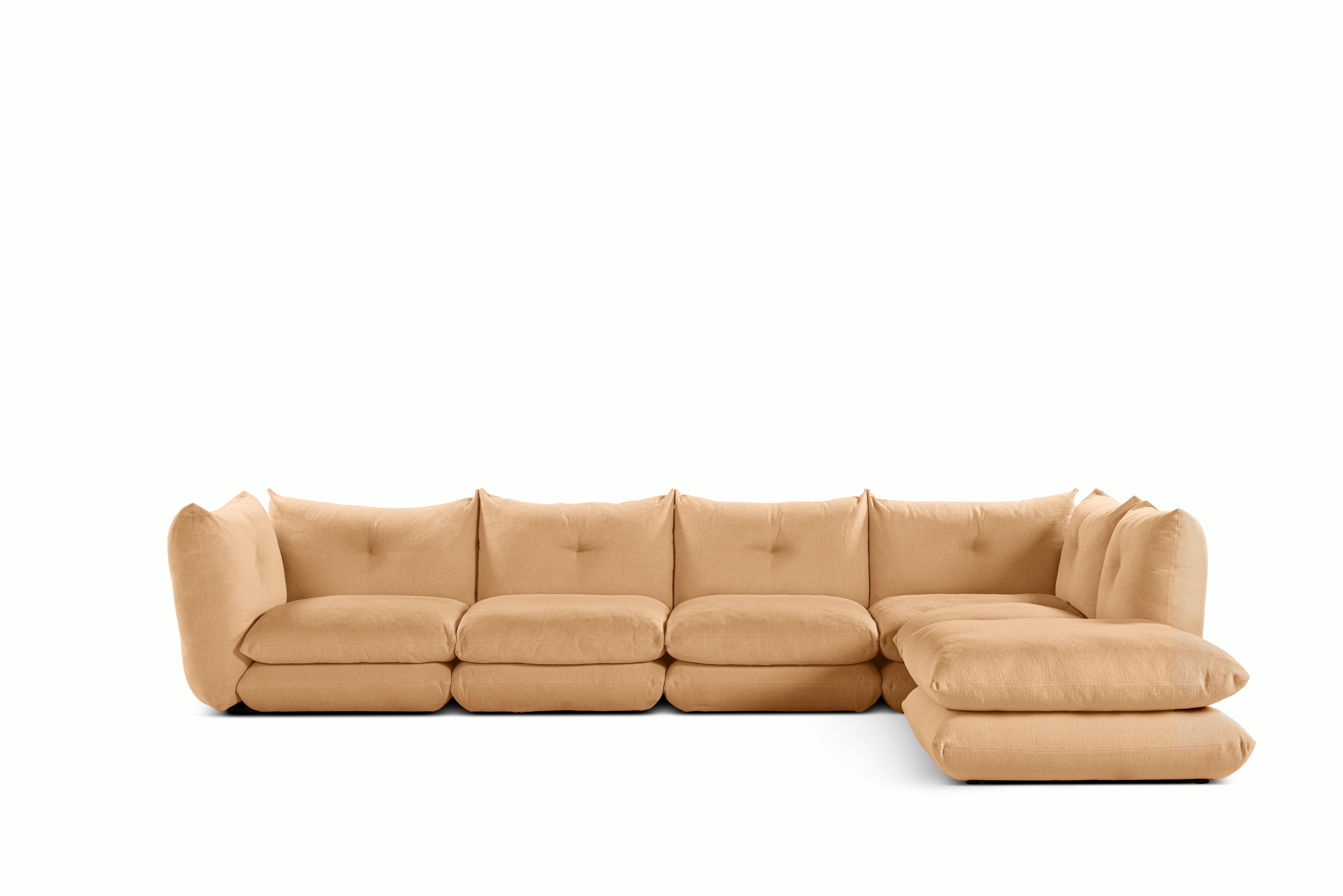 A Perron Pillo Sectional in Rose Gold viewed from the front.