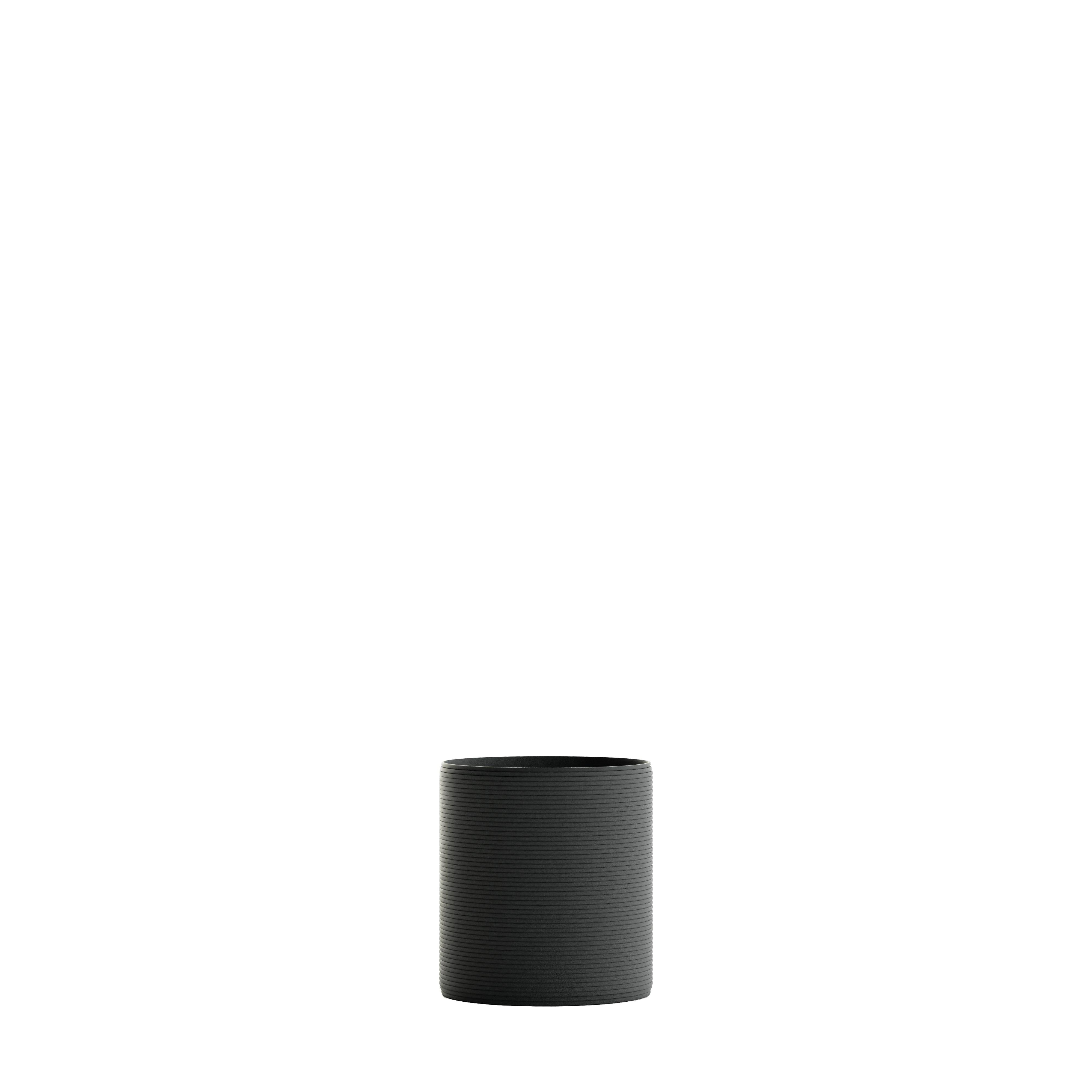 A Solana 3D Printed Concrete Planter in Obsidian Night Viewed from the front.