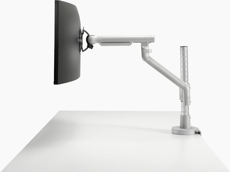 Flo Modular monitor arm silver viewed from the side.